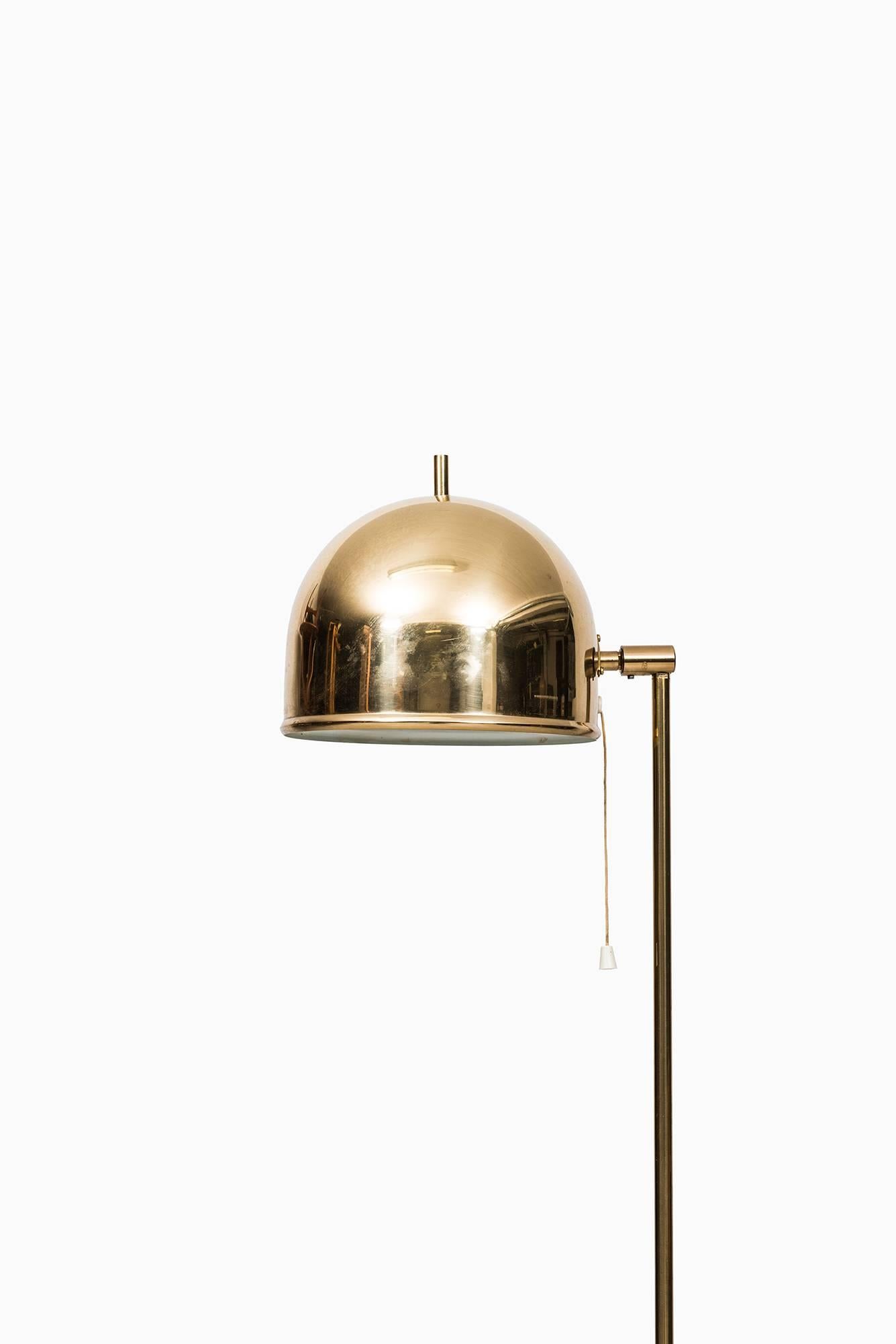 Floor lamp in brass. Produced by Bergbom in Sweden.