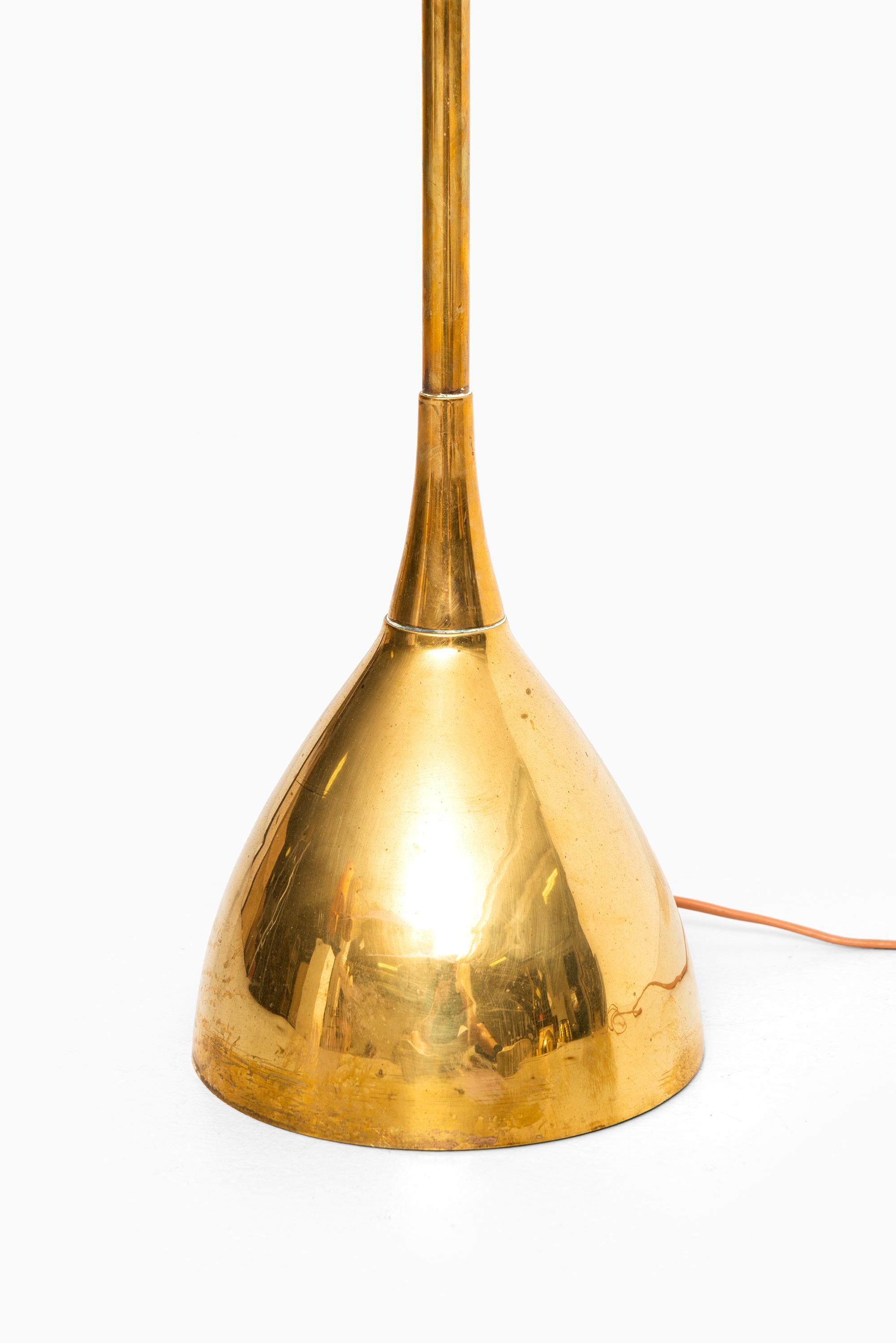 Rare and heavy floor lamp in brass. Produced by Stilarmatur in Tranås, Sweden.