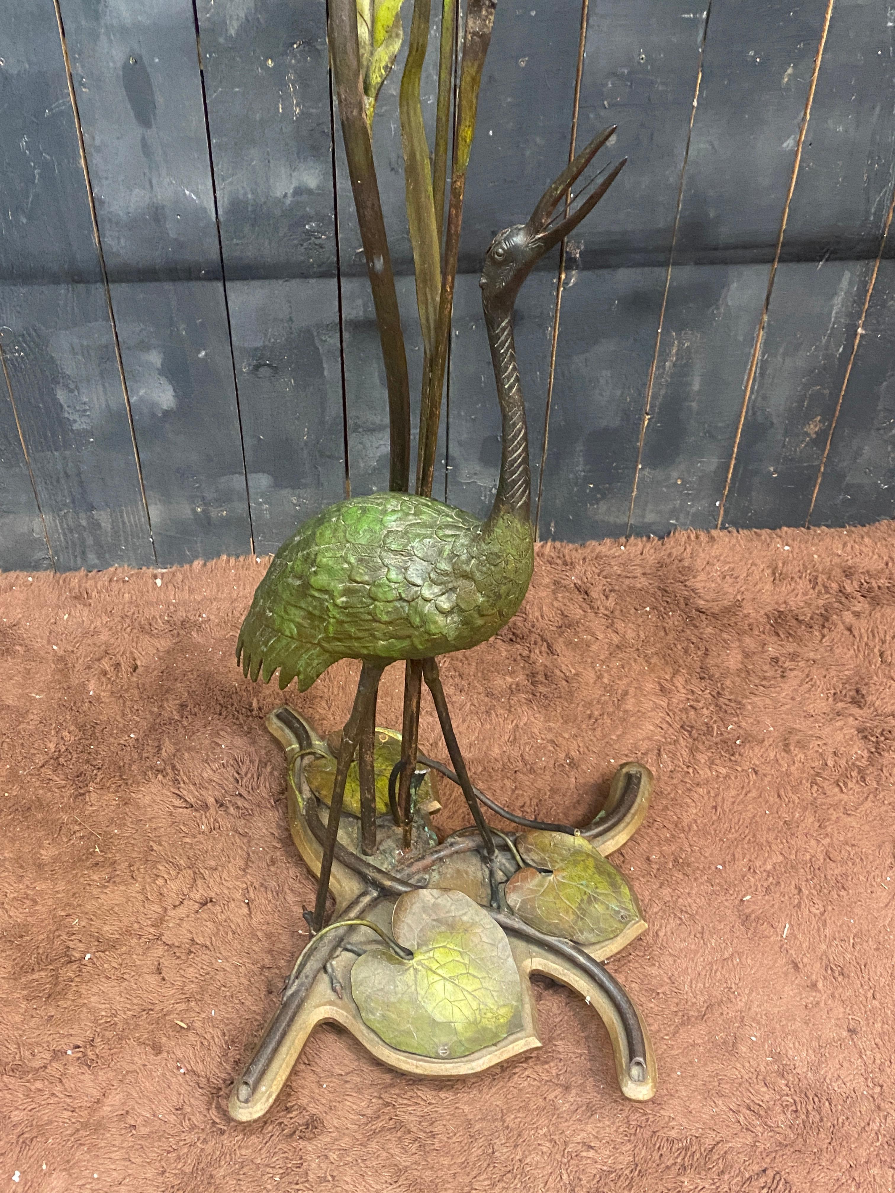 Art Nouveau Floor lamp in bronze and painted metal decorated with a wader, circa 1900/1930 For Sale