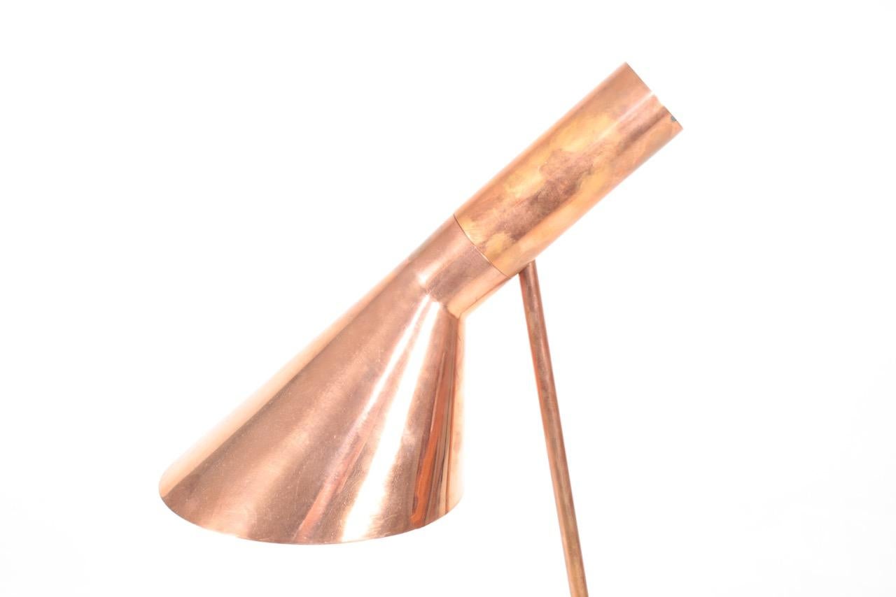 Rare floor lamp in copper. Designed by Maa. Arne Jacobsen for the SAS Royal Hotel in 1958 and made by Louis Poulsen Denmark, great condition.
