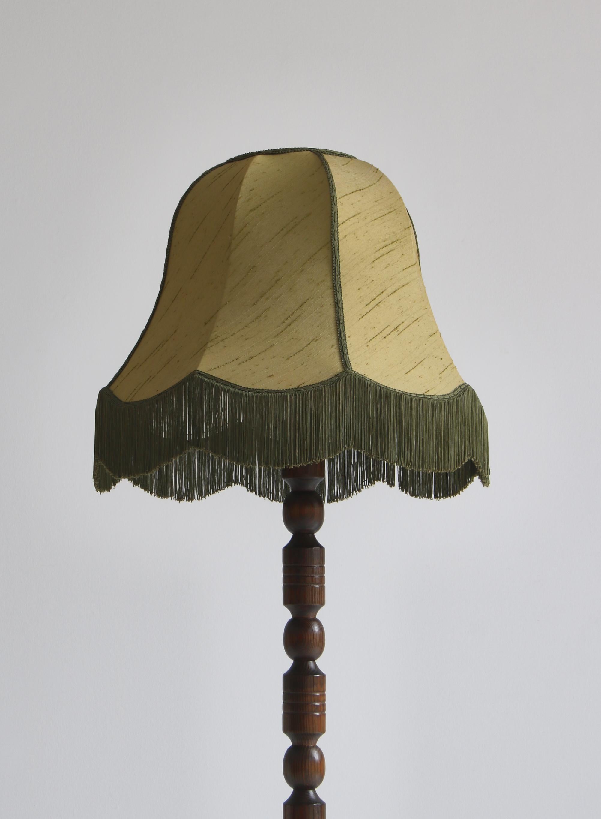 floor lamp with fringe shade