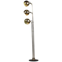 Lampada da terra in metallo dorato di Stilnovo con 3 teste rotanti e piede nero