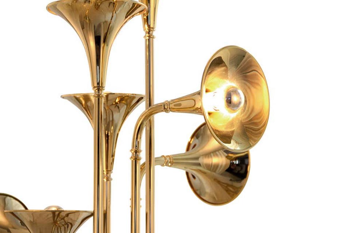 Floor lamp in gold and brass

Estimated production time: 6-7 weeks

Dimensions:
Height 70.87 in. (180 cm)
Diameter 24.81 in. (63 cm)

8 x E14 Bulbs (included) (E12 for USA not included)max 40W per bulb

Base: Gold-plated and white