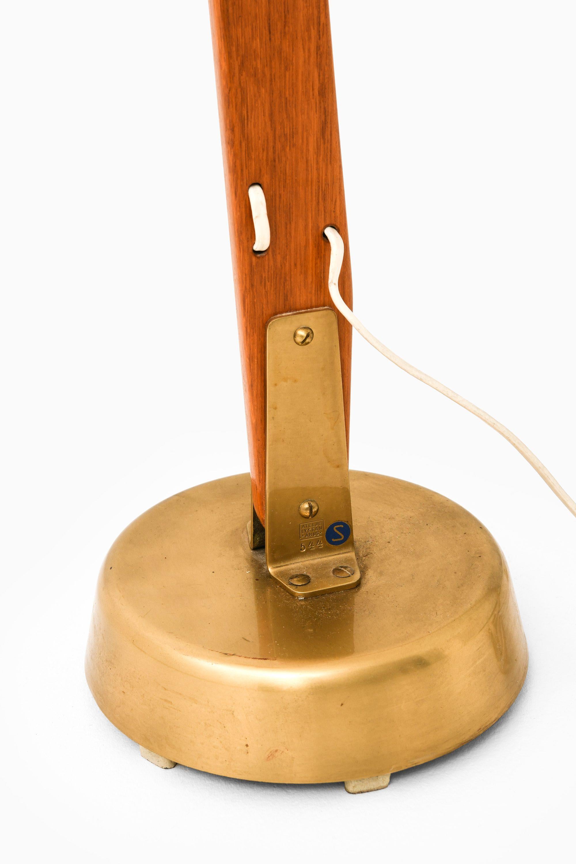Teck Lampadaire en teck, laiton et abat-jour original par Hans Bergström, années 1950 en vente