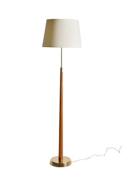 Floor lamp in wood and brass by Hans Bergström for Asea, 1940s