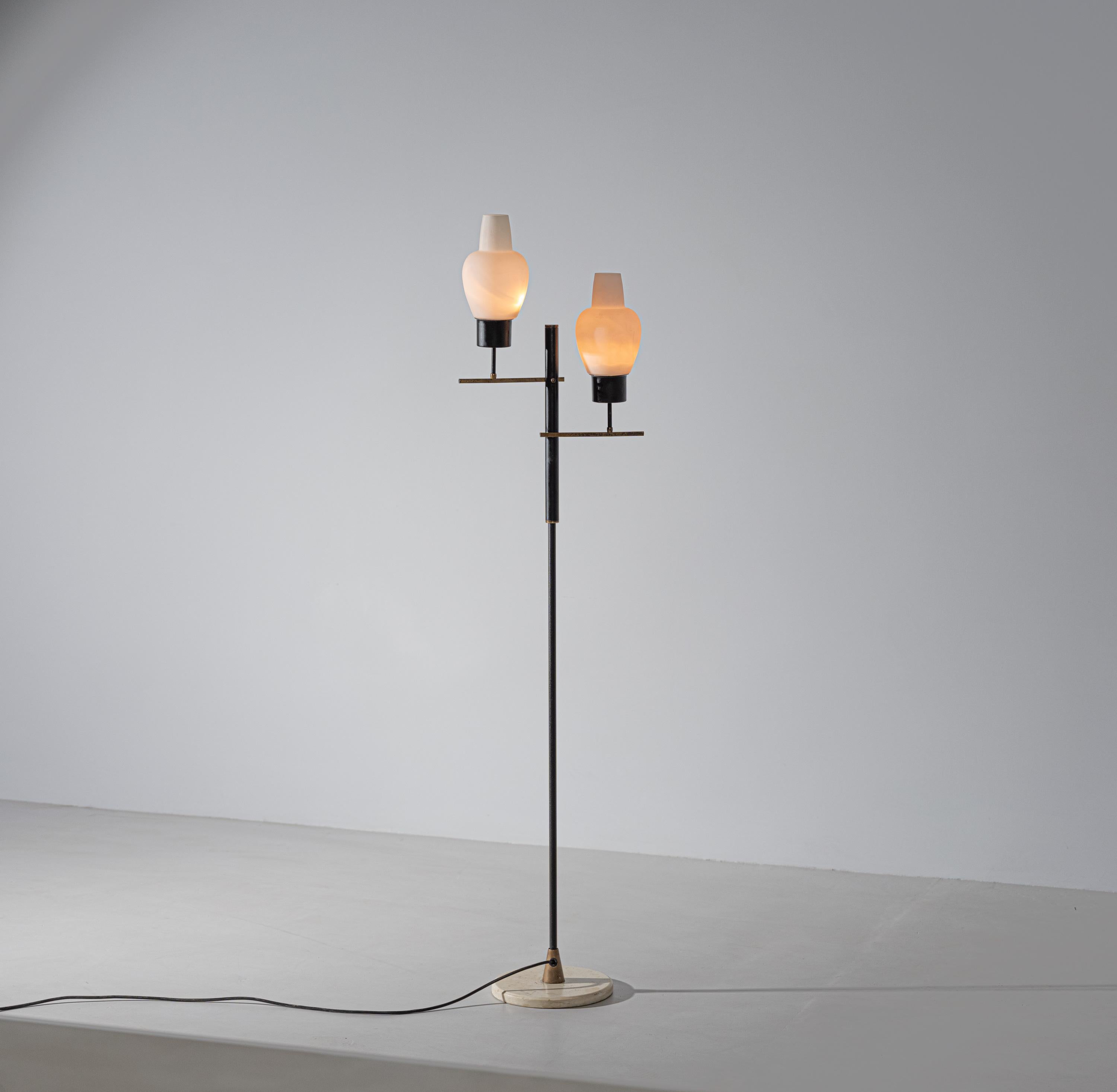 Floor lamp, black lacquered steel, opaline glasses, brass, Italy, 1950s. 

Elegant base lamp of Italian design, produced in the 1950s. Made of iron, brass and opal glass diffusers. 
This floor lamp is in original condition.

2 standard E14