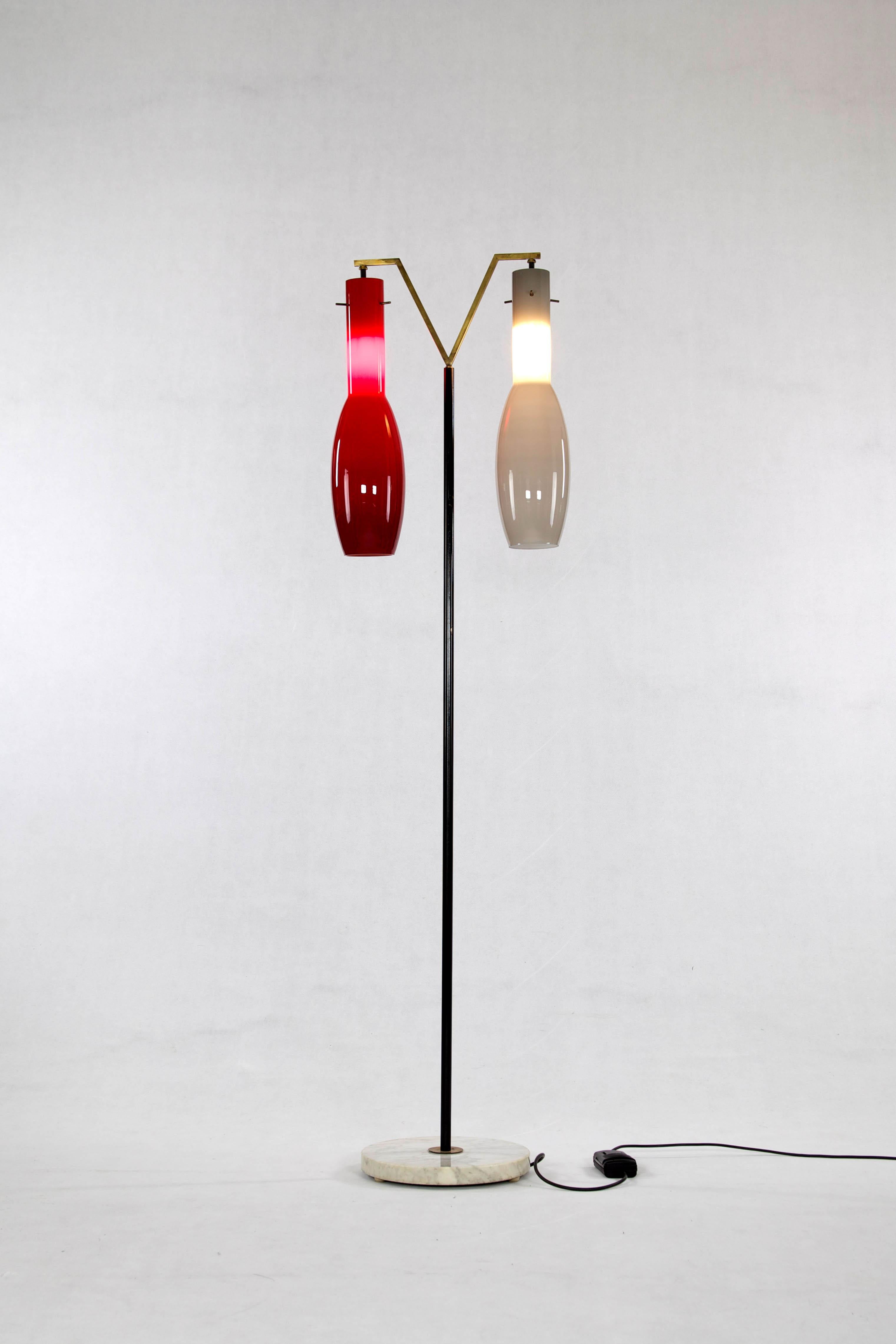 Floor lamp, Italy, 1950s. This lamp is built of two-tone glass shades, a marble base, lacquered iron bar and brass elements.
 
Feel free to contact us for more detailed pictures.