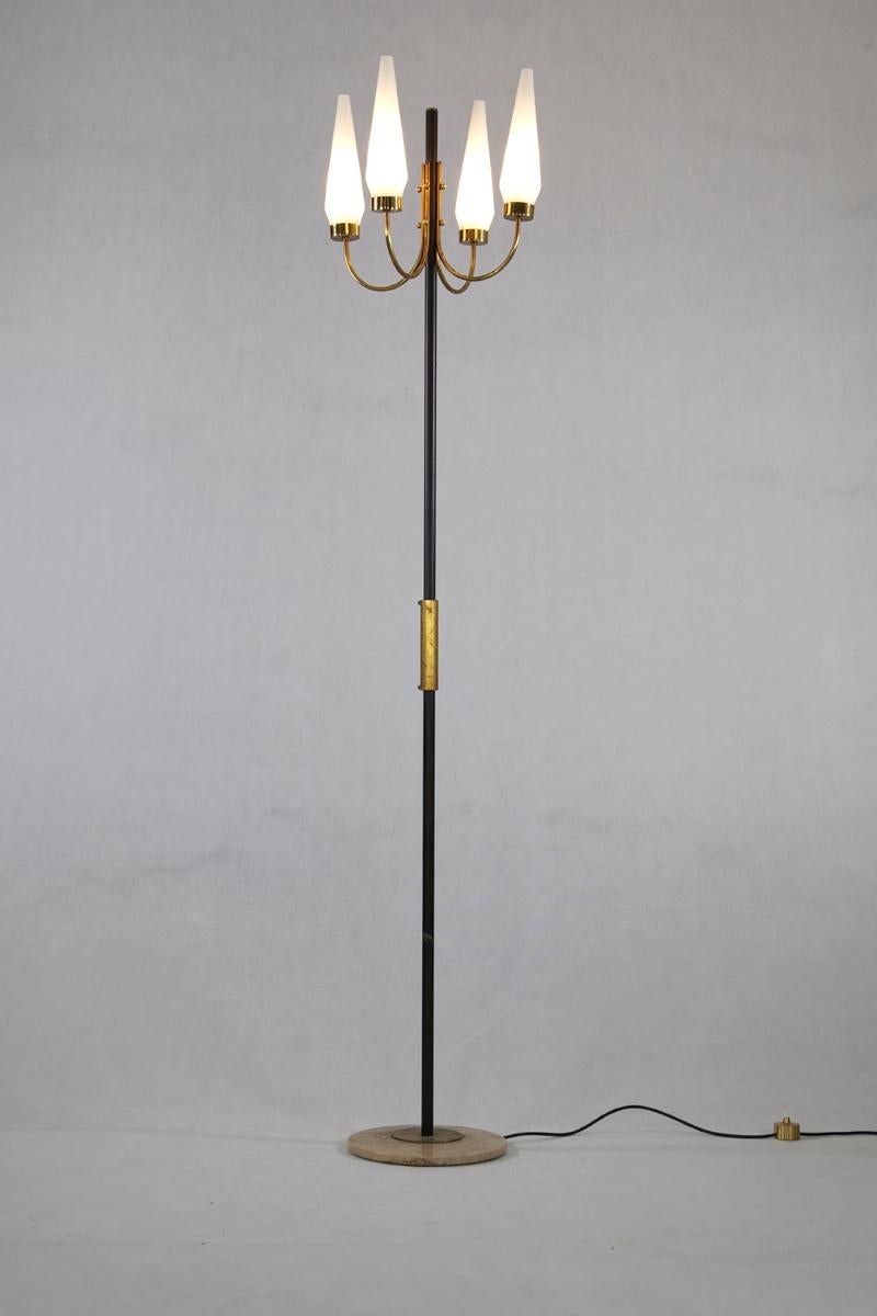 Floor lamp from Italy, 1950s. The lamp has four opaline glass shades, a lacquered metal frame, brass fittings and a marble base.

Feel free to contact us for more detailed pictures.