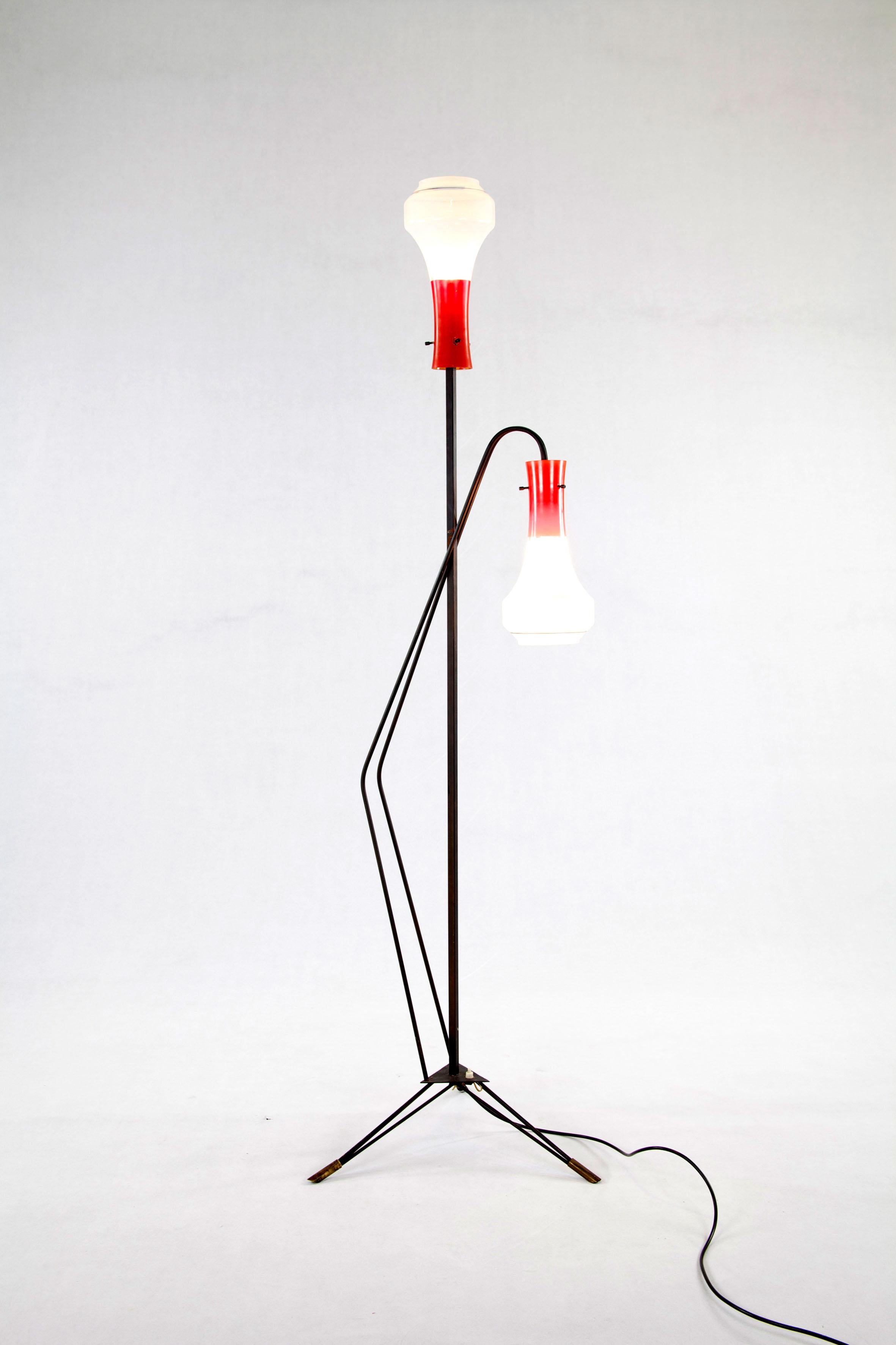 Floor lamp by Vetreria Laguna Murano from Italy, 1950s. This lamp has a black lacquered iron frame, brass fittings and a two-tone glass shade. 

Feel free to contact us for more detailed pictures.