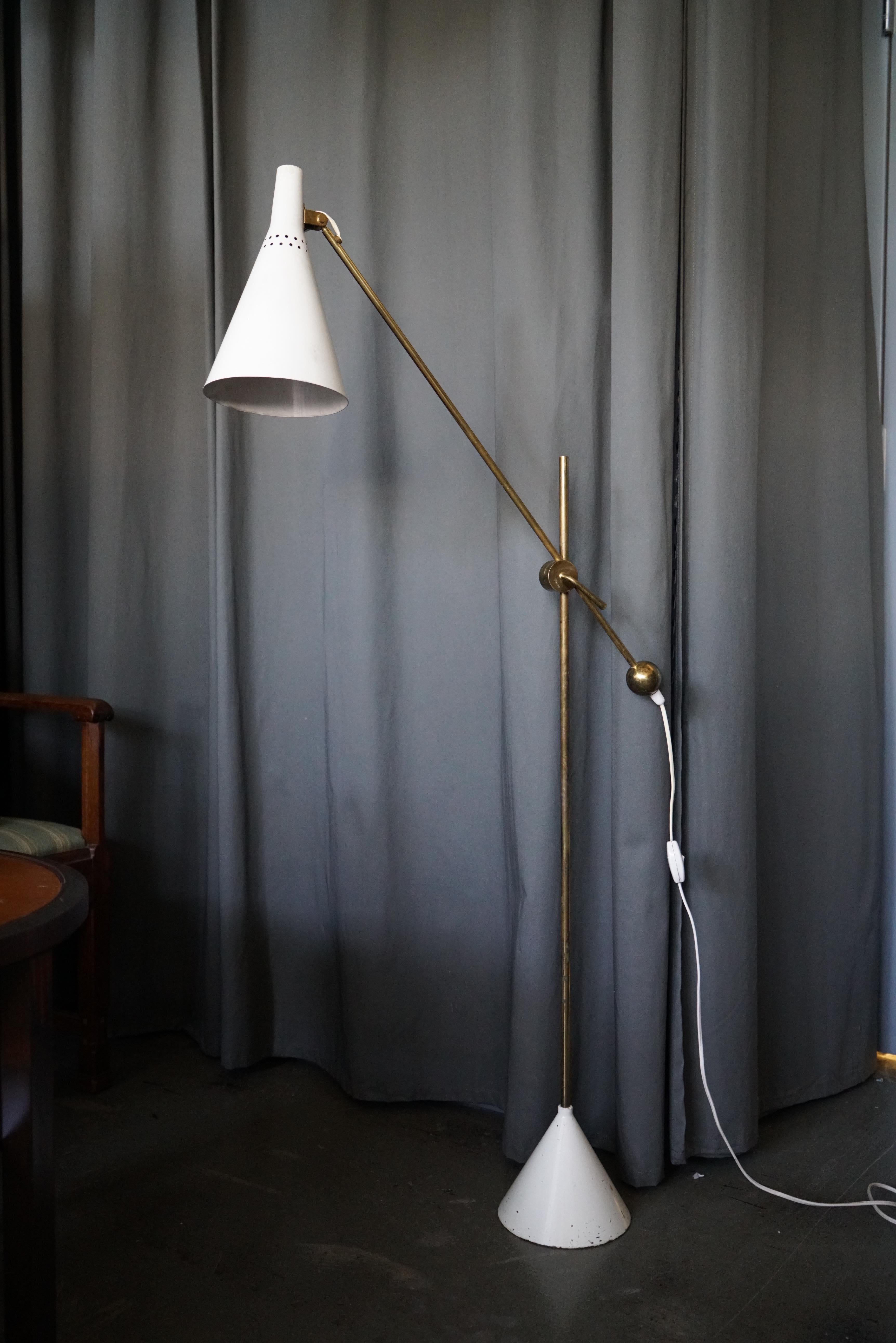 Floor Lamp “K10-11 ” designed by Tapio Wirkkala for Idman, Finland, circa 1950th. Rare, original lacquered finish on shade, patina on brass parts. Stamped 