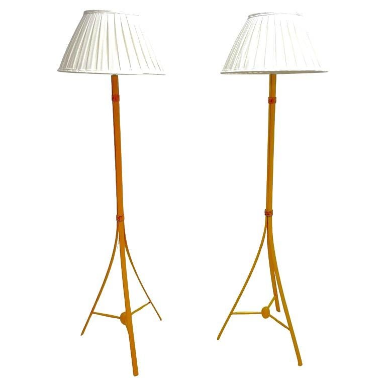 Floor lamp in beech with tripod base and leather ties by Alf Svensson for Bergboms. Modernist design but with natural, traditional materials. These floor lamps are very elegant and provide a cool atmosphere and lighting. Swedish designer Alf