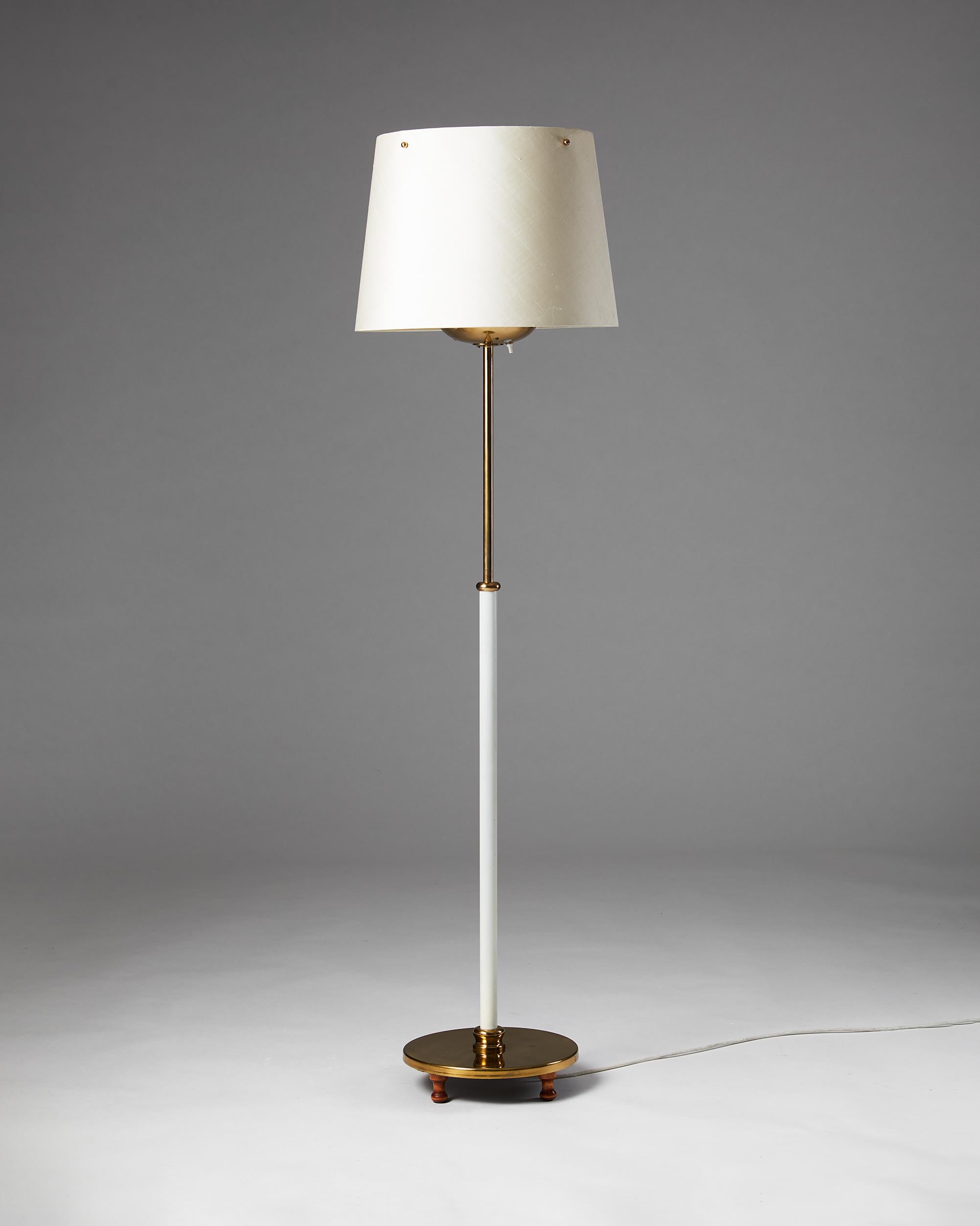 Floor lamp model 2564 designed by Josef Frank for Svenskt Tenn, 
Sweden, 1950s.

Polished and lacquered brass with textile shade.

Dimensions:
H: 151 cm
D: 36.5 cm
Base D: 28.5 cm

Josef Frank was a true European, he was also a pioneer of what would