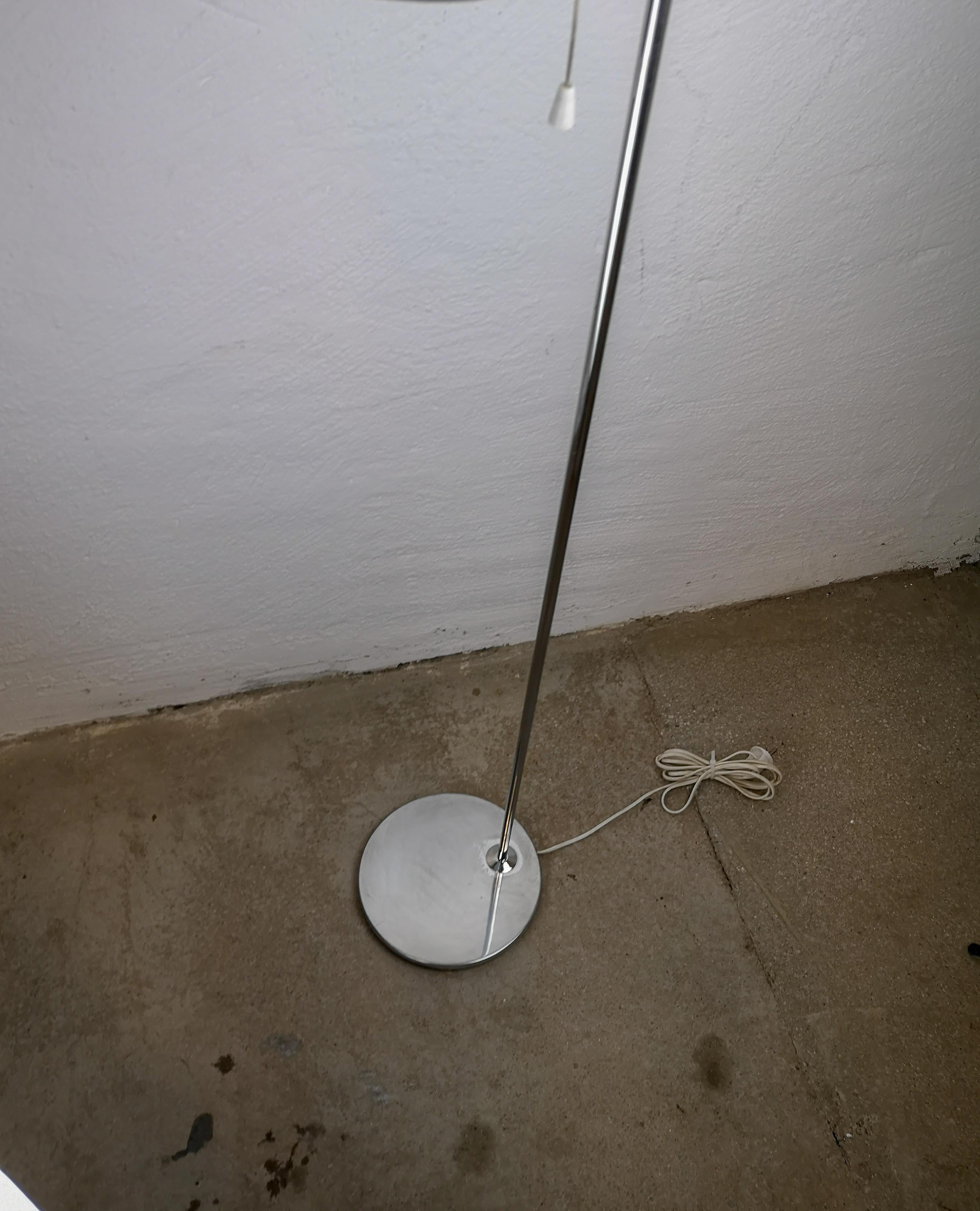 This floor lamp made by Bergboms Sweden in the 1960s is in chrome steel. It’s a little bit rarer then the brass one.

Good fair working condition

Measures: H 130 cm W 20 cm D 25 cm.
 