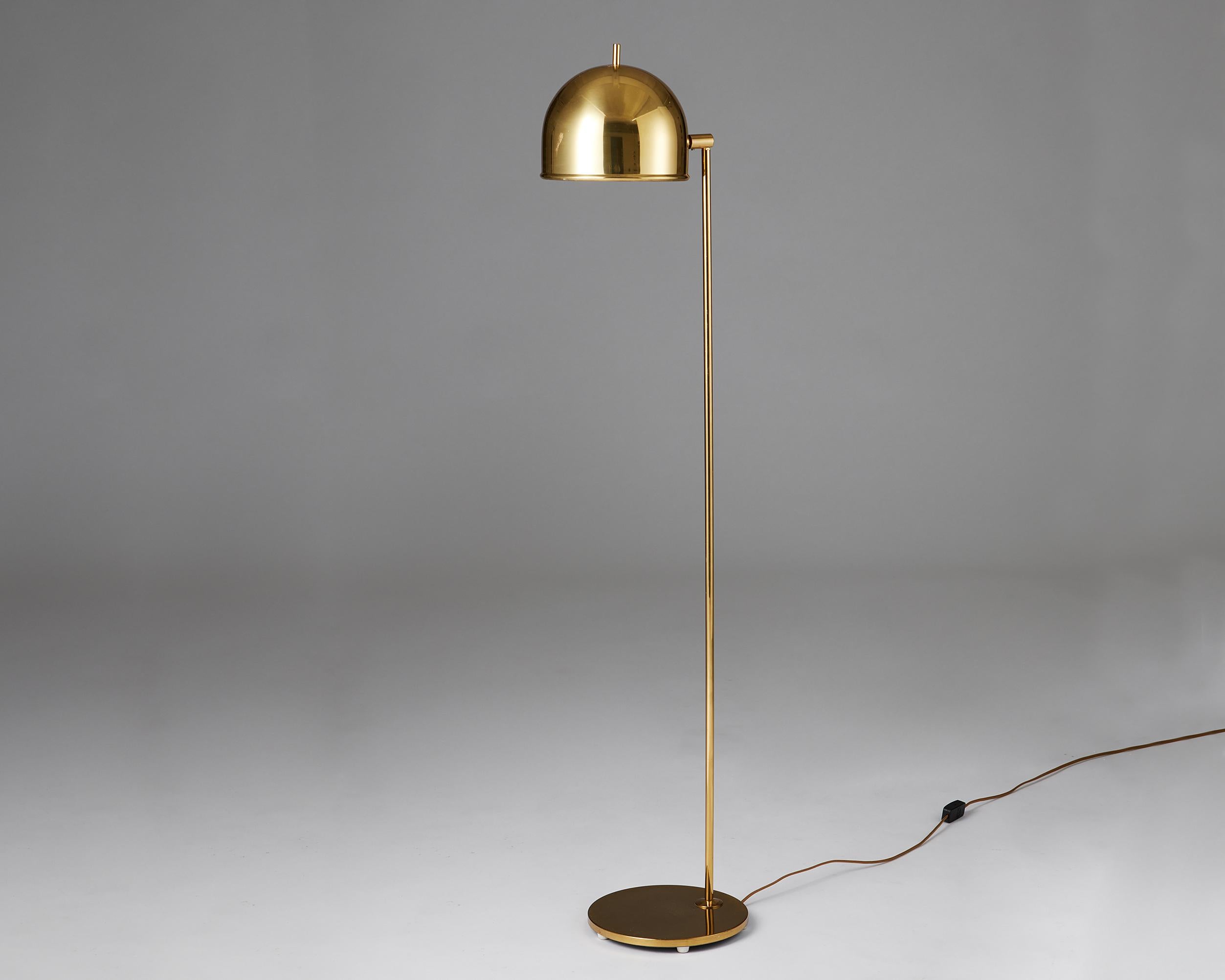 Floor lamp model G-075 designed by Eje Ahlgren for Bergboms,
Sweden. 1960s.
Brass.

Stamped.

This floor lamp, made with a fully adjustable shade, was manufactured in brass by Bergboms and designed by Eje Ahlgren. The protruding brass rod at