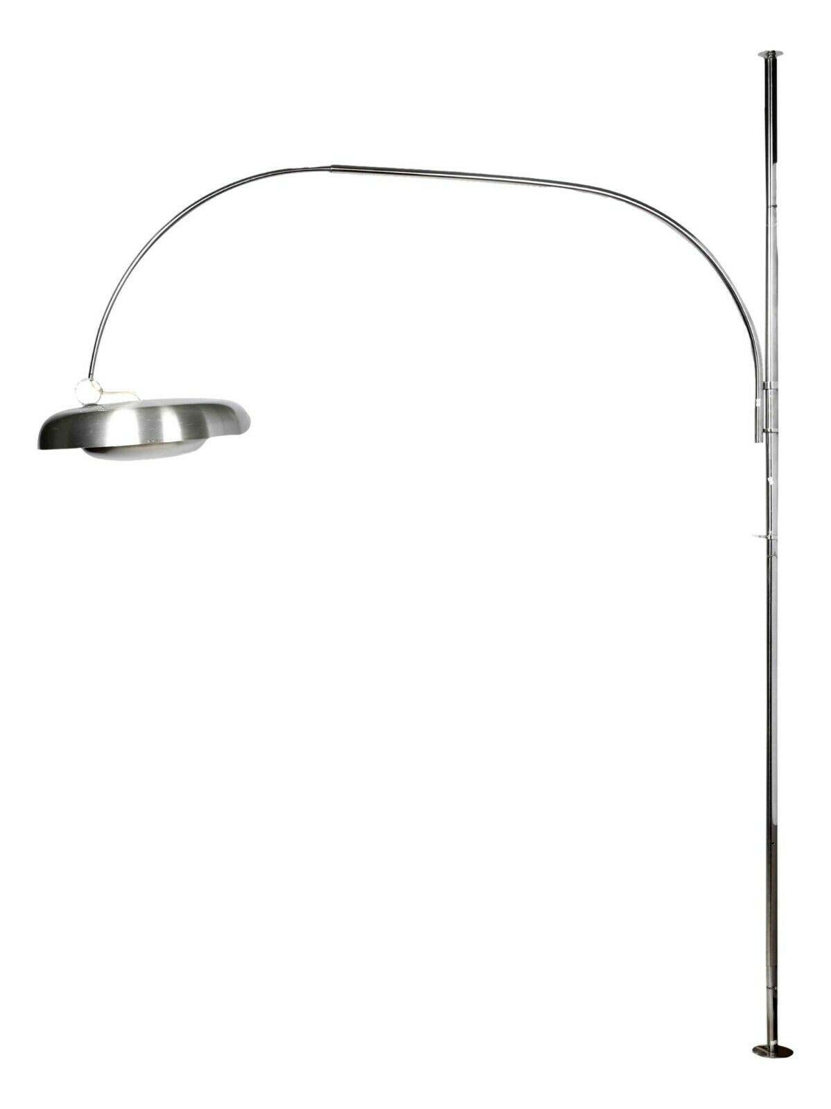 splendid and rare arched floor lamp, model PR, Sirrah production based on a design by Pirro Cuniberti, 1970s

Made of brushed steel, with height-adjustable aluminum diffuser

It measures approximately 320 cm in overall height, 280 cm projection,