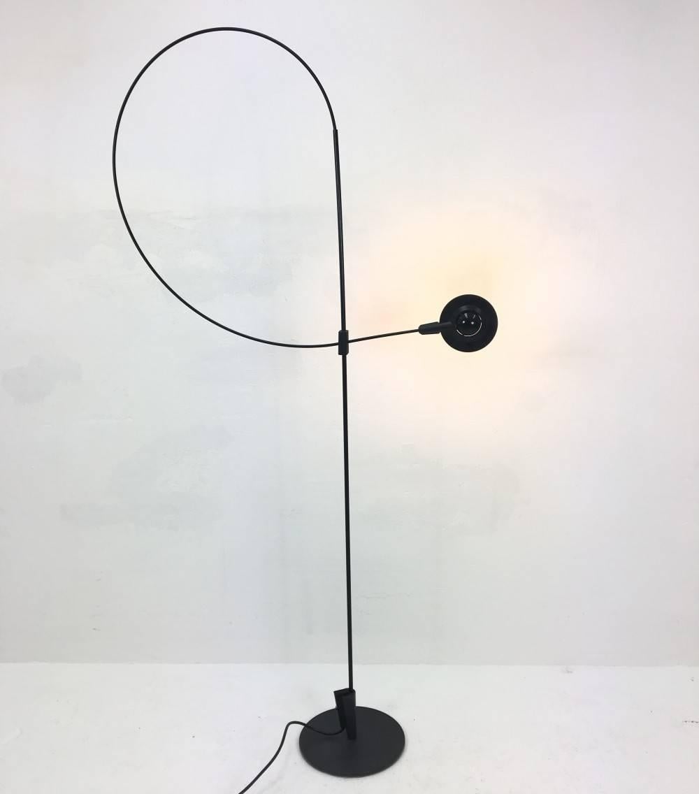 This floor lamp was designed by Rene Kemna for Sirrah in Italy in the 1980s. The structure allow the light and shade to articulate into various positions (head of lamp swivels 360 degrees).The tension of the form of this desk lamp is beautiful.