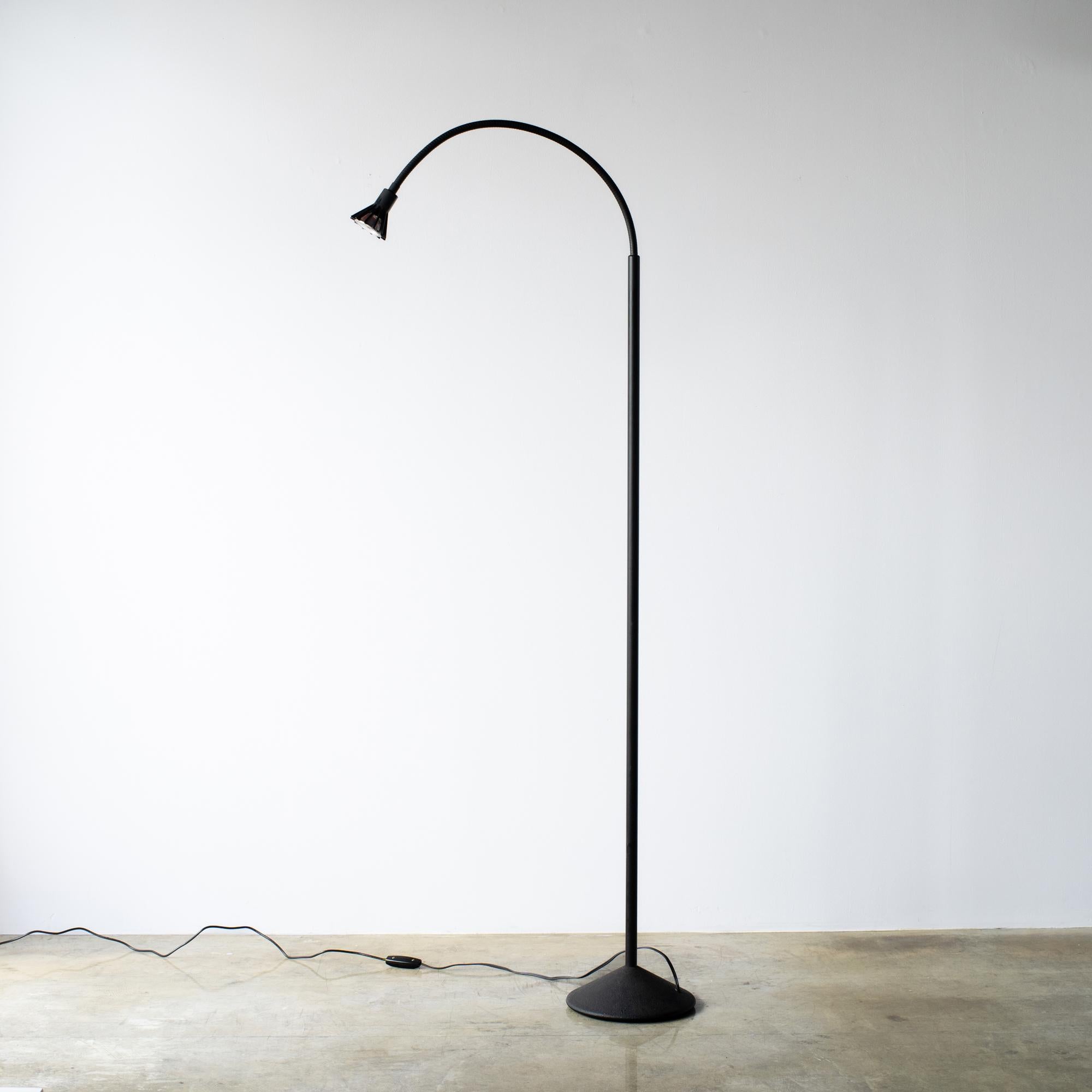 Floor lamp designed by Raul Barbieri and Giorgio Marianelli for Tronconi. The name is Solitaire. black steel painted body. 
It has flexible arm to turn in any direction. Light covers small area. Suitable for the time of reading books sitting on the