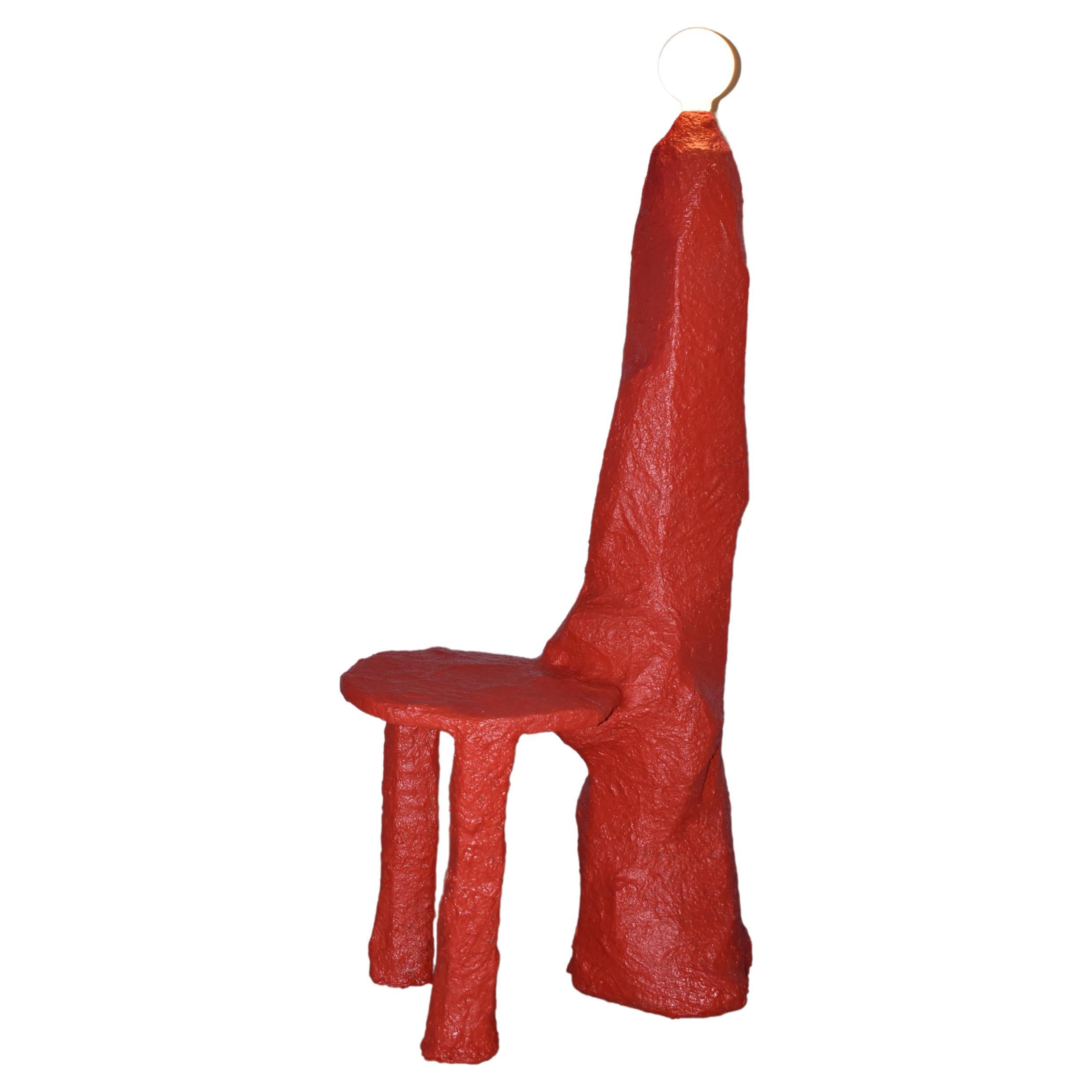 The Obelisco is a unique and eco-friendly piece of furniture that combines the functionality of a chair and a lamp, all while embracing sustainable design principles. Crafted entirely from recycled paper, this innovative creation is a testament to
