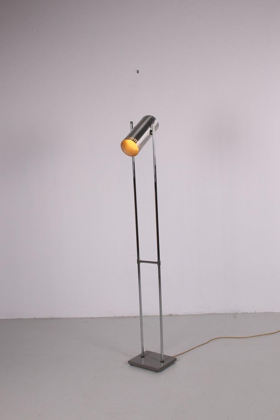 Trombone II, aluminum floor lamp by Jo Hammerborg for Fog & Mørup in 1966 - a 
beautiful Danish midcentury floor lamp in very good vintage condition.

A sleek shaped floor lamp with a square gray lacquered metal base, from where two aluminum