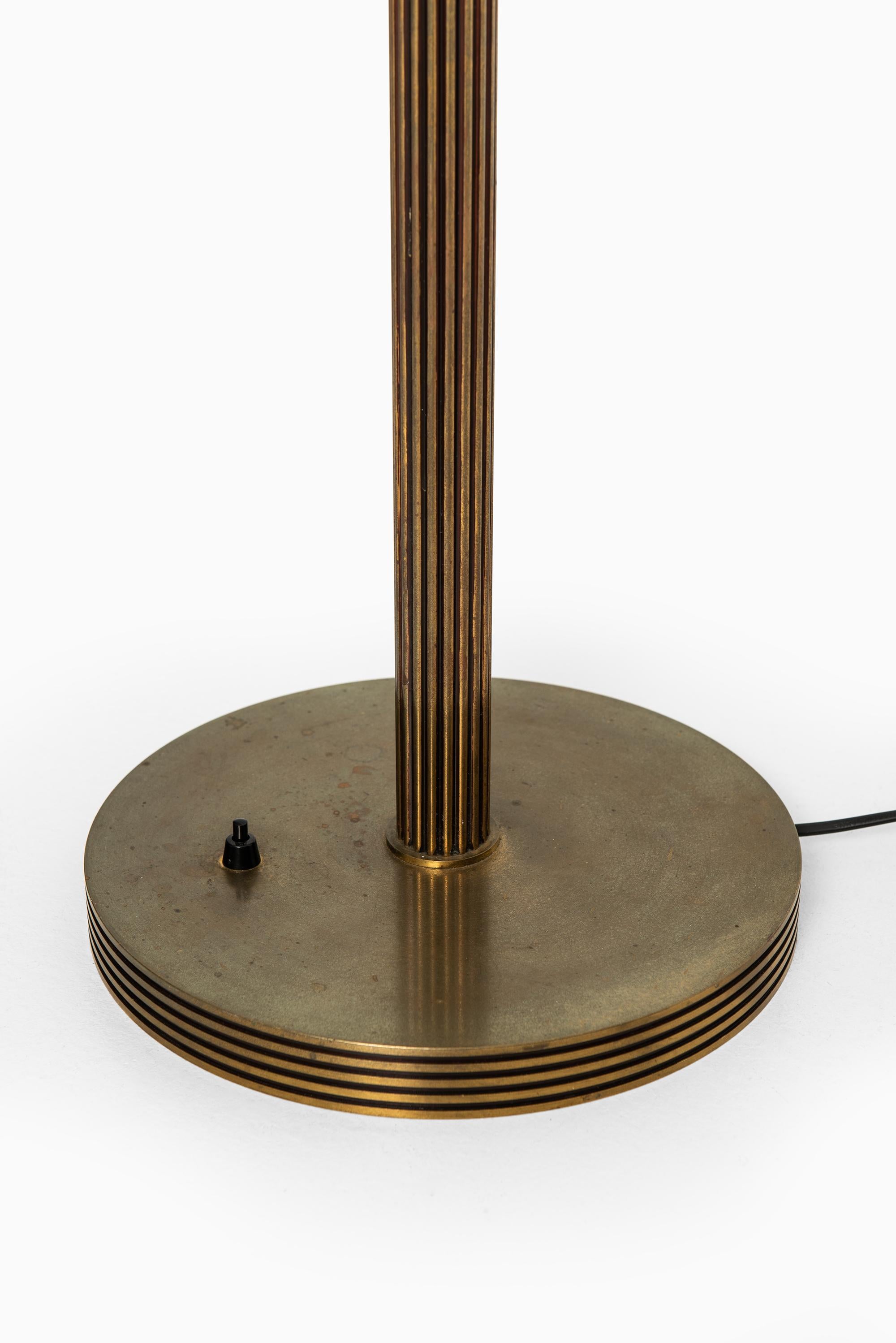 Scandinavian Modern Floor Lamp / Uplight in Brass and Glass Produced in Sweden