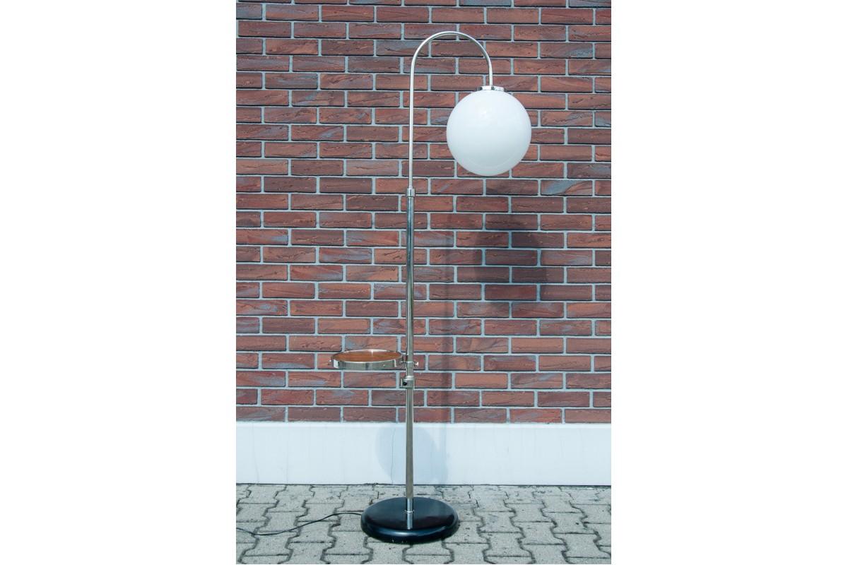 Floor lamp from Czechoslovakia, 1930s
Designed by famour Jindrich Halabala. 
Lamp after renovation, new white shade.
New wires, european plug. 
Excellent condition. 
Dimensions: H 189 cm / W 66 cm / D. 40 cm.


