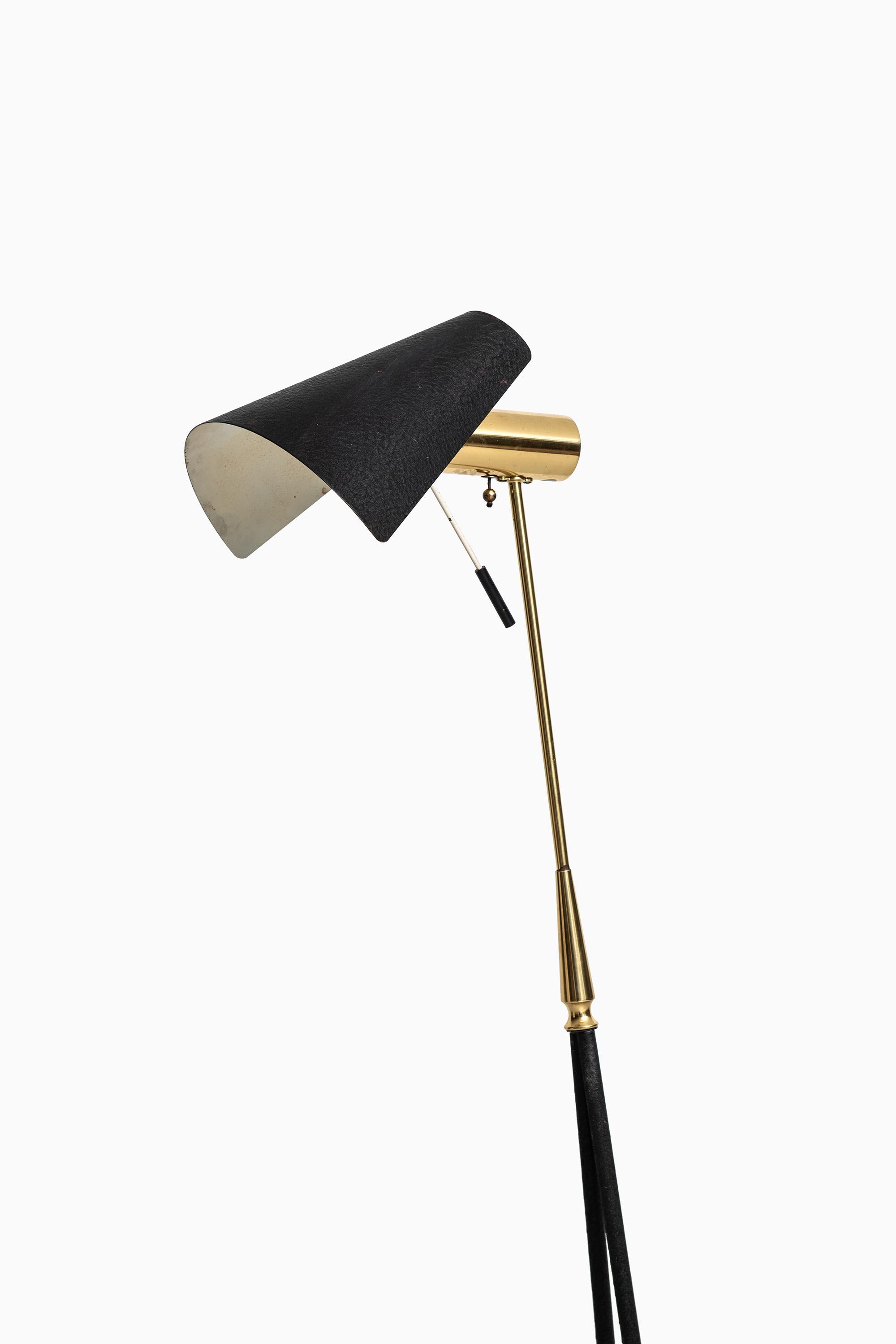 Rare floor lamp with adjustable shade. Produced by Falkenbergs belysnings in Sweden.