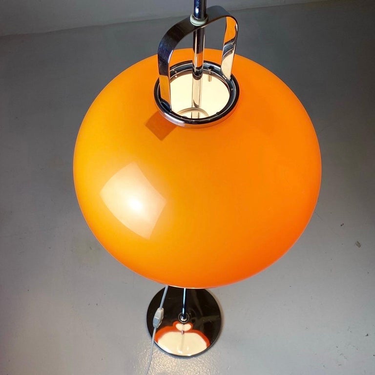Classic Harvey Guzzini orange floor lamp made in Italy 1970s

Label inside and outside the stunning plastic shade. The shade is height adjustable and has two light sources. 

Excellent condition.

This floor lamp is only sold in EU due to the size.
