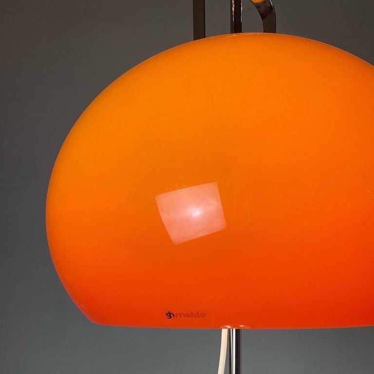 Space Age Floor lamp with orange shade by Harvey Guzzini, Italy 1970s. For Sale