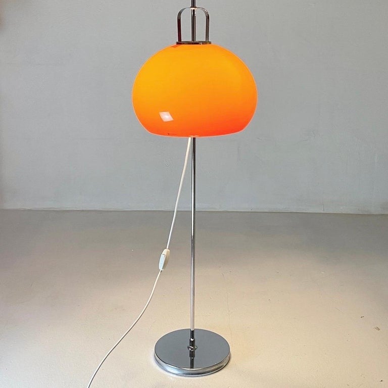 Italian Floor lamp with orange shade by Harvey Guzzini, Italy 1970s. For Sale
