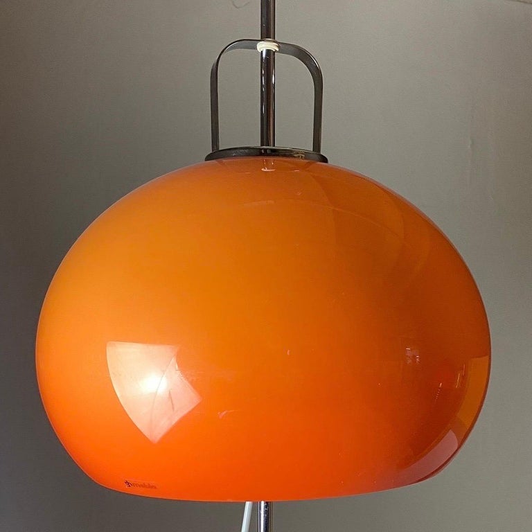 Floor lamp with orange shade by Harvey Guzzini, Italy 1970s. For Sale
