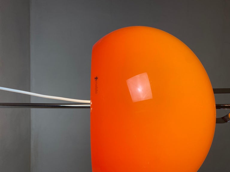 Late 20th Century Floor lamp with orange shade by Harvey Guzzini, Italy 1970s. For Sale