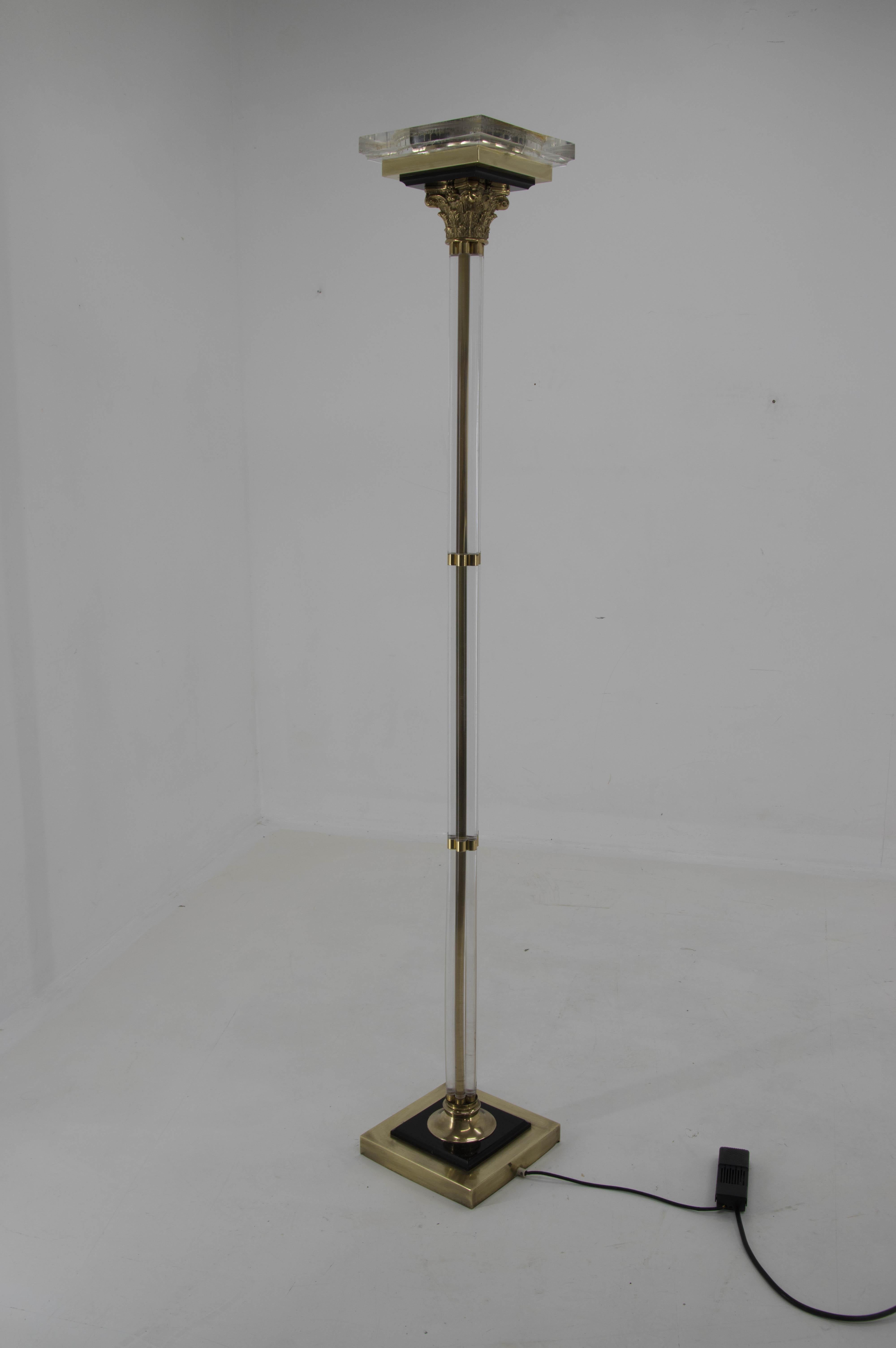 Torch uplight floor lamp in a shape of an Antic column.
Made in Italy in 1970s or 1980s
Made of brass resin and glass.
The light is dimmable including foot switch.
The top transparent resin plate has visible cracks in the photo, but they have no