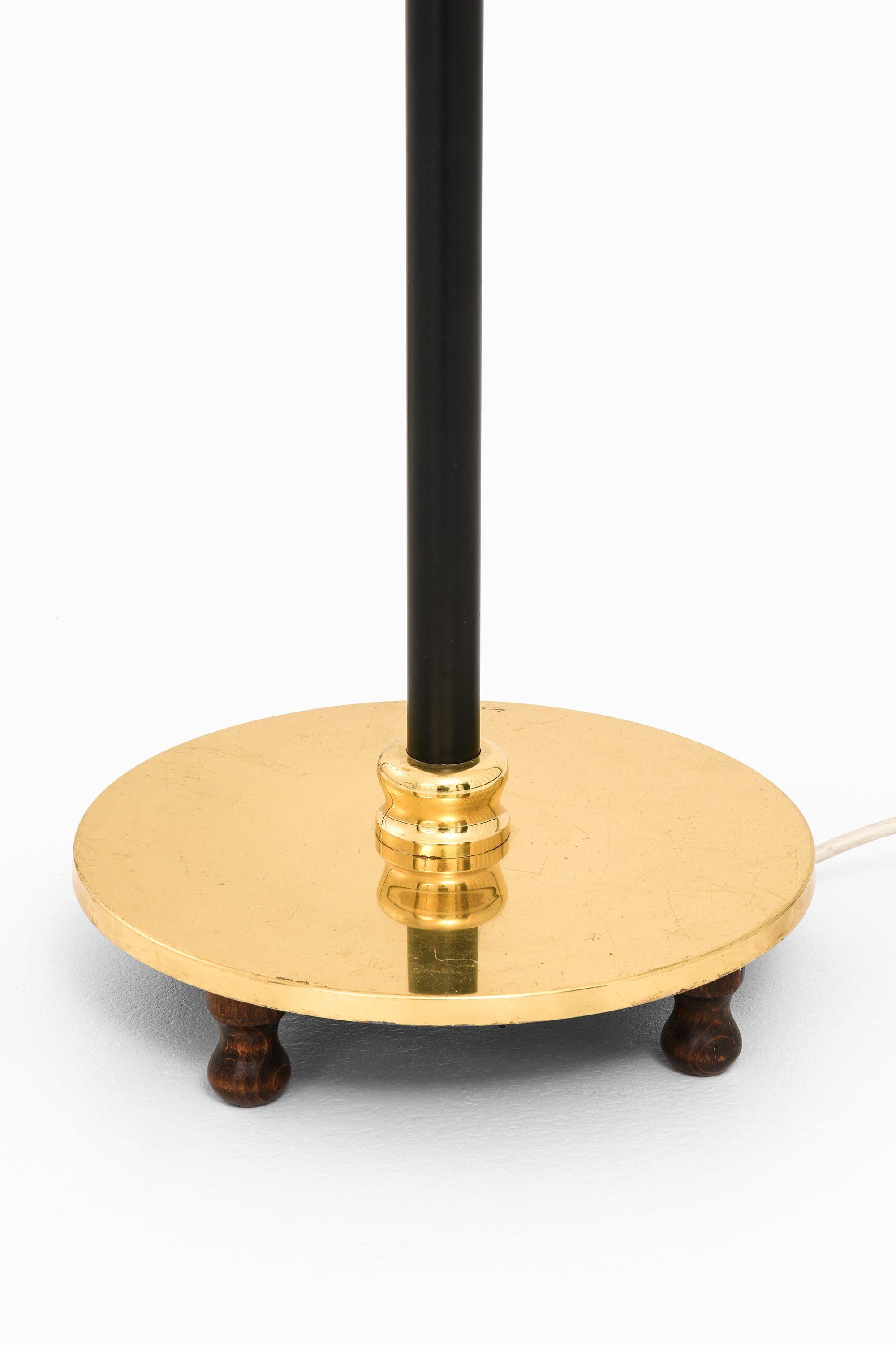 Scandinavian Modern Floor Lamps in Brass, Black Metal & Original Lamp Shades by Josef Frank, 1960's For Sale