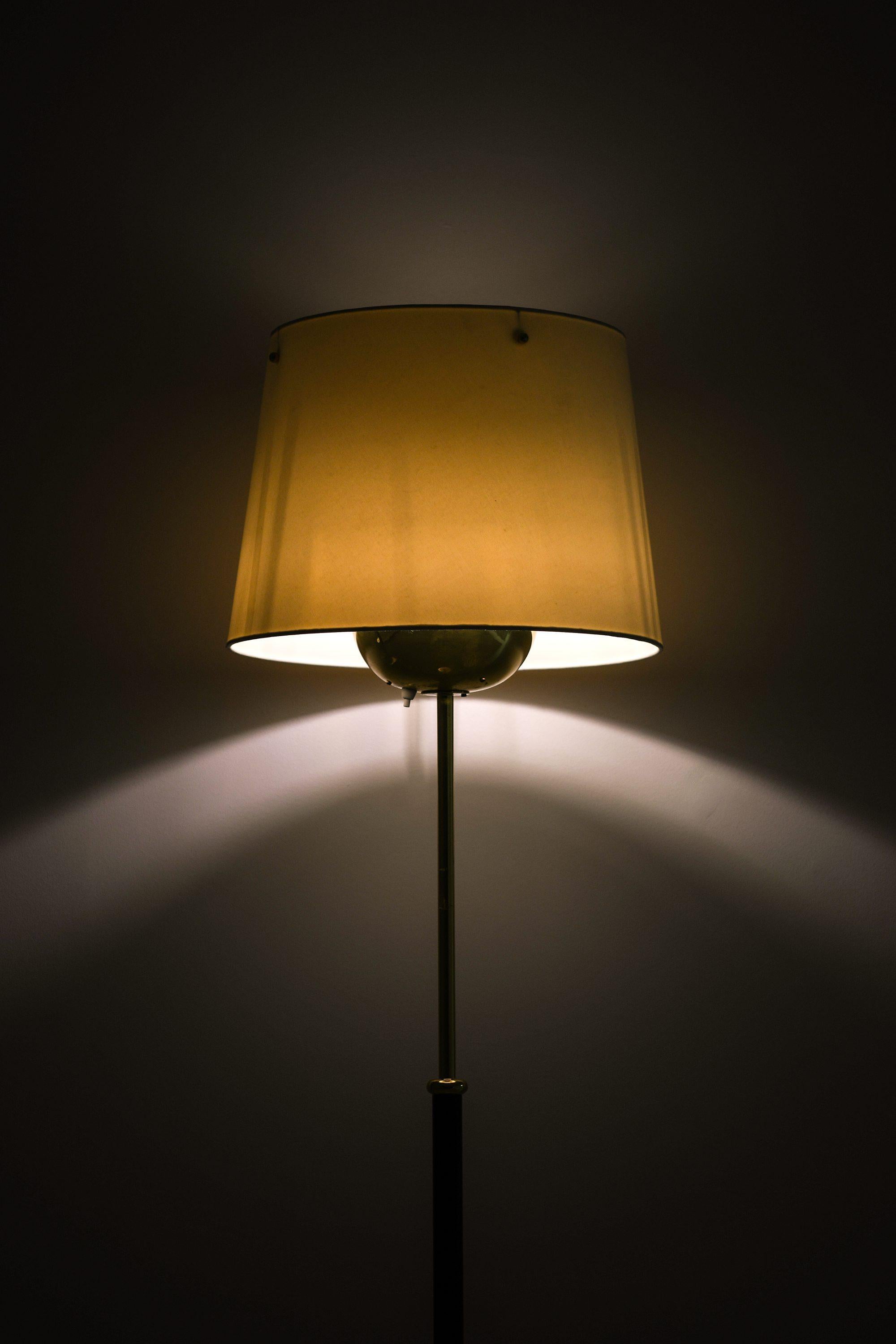 Floor Lamps in Brass, Black Metal & Original Lamp Shades by Josef Frank, 1960's In Good Condition For Sale In Limhamn, Skåne län