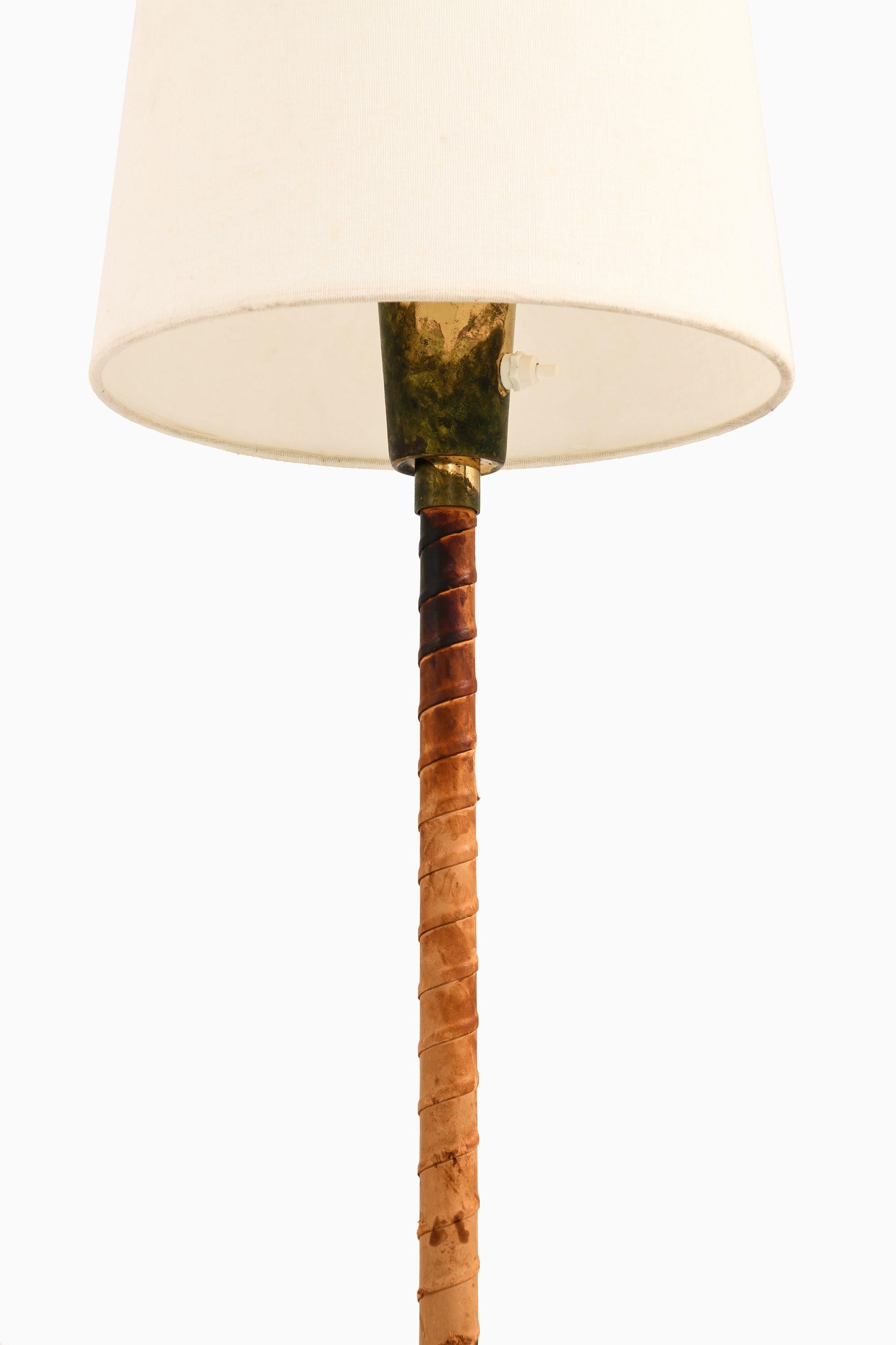 Scandinavian Modern Floor Lamps in Leather, Brass and Lamp Shades by Lisa Johansson-Pape, 1950's For Sale