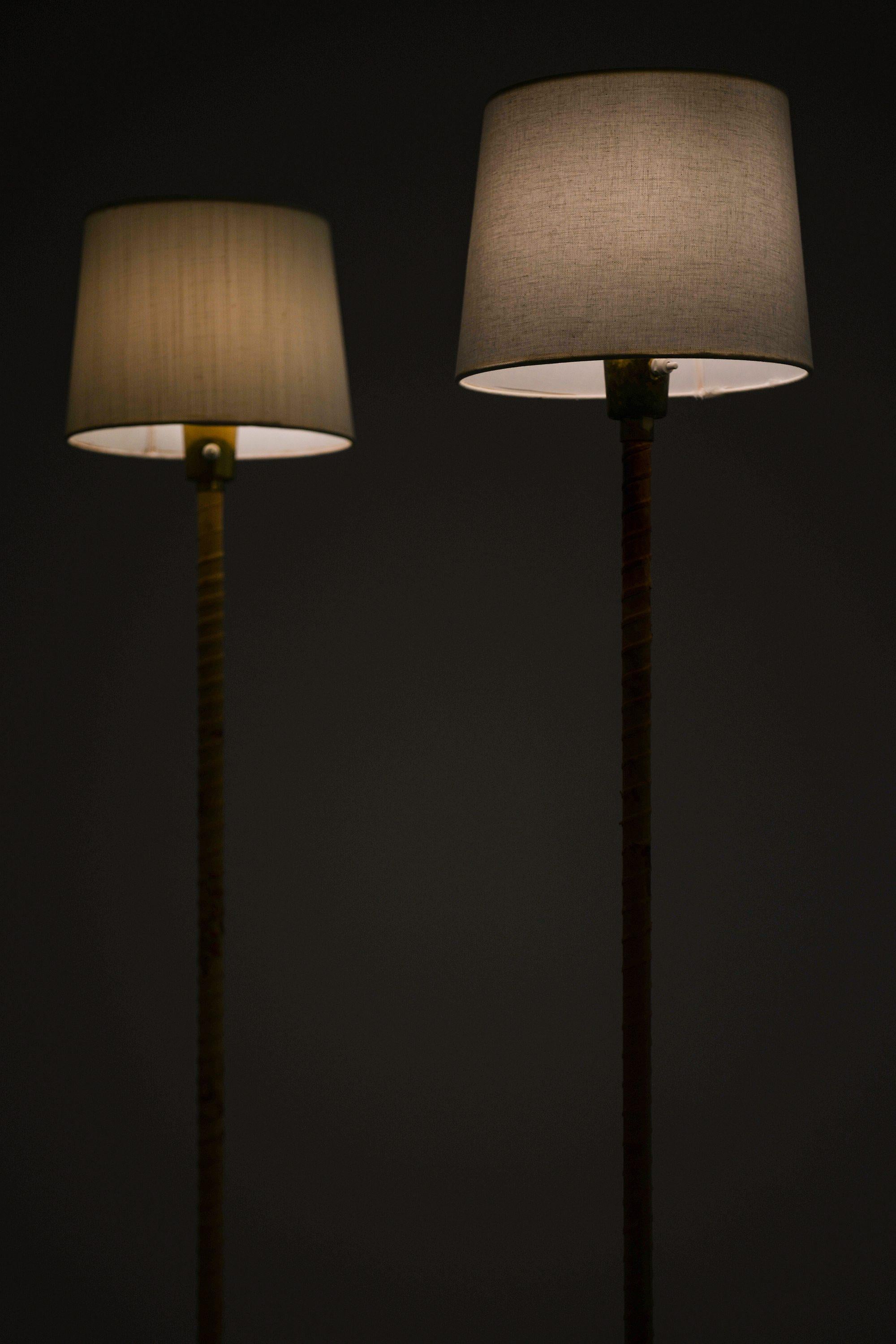 Floor Lamps in Leather, Brass and Lamp Shades by Lisa Johansson-Pape, 1950's In Good Condition For Sale In Limhamn, Skåne län