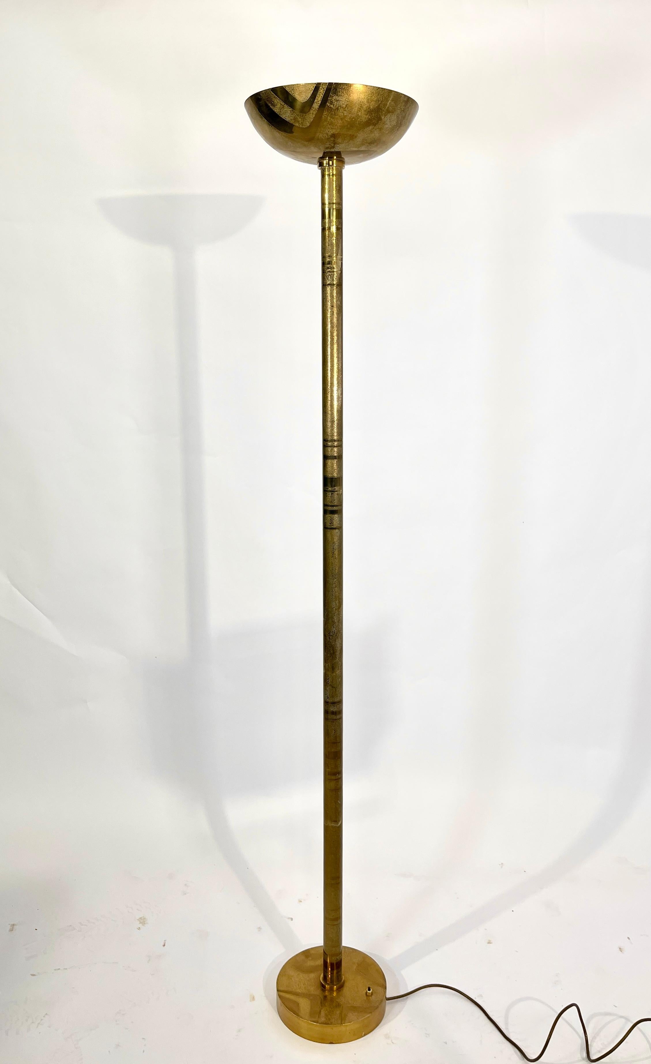 From the 1980s comes this one of a kind floor lamps in FULL etched brass. This Floor lamps received new electric al wires according to the latest safety standards. Signed by the artist. 
This Rare Floor Lamps is ONE OF KIND piece special order for a
