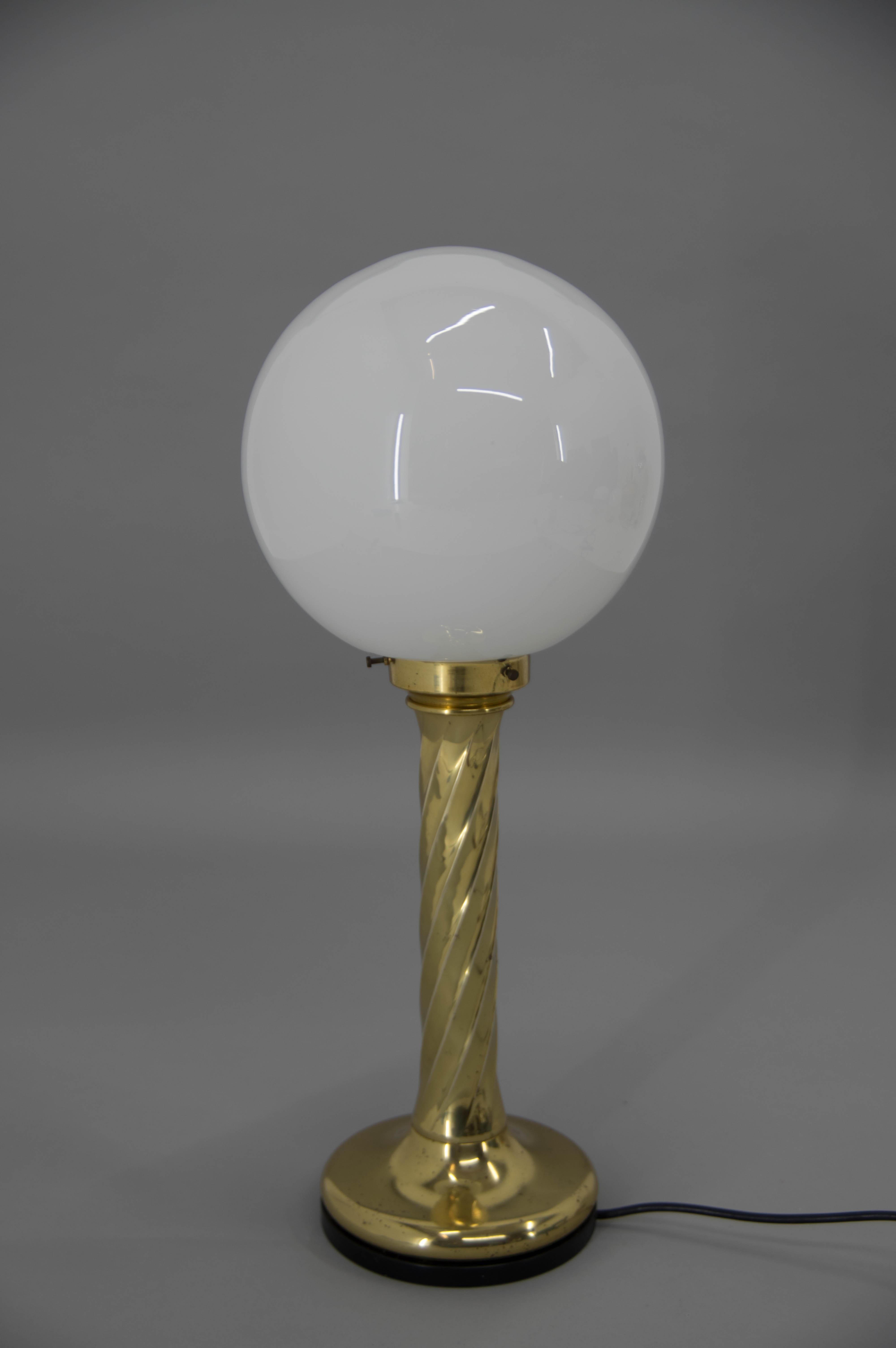 This BIG (height: 62cm, 24in) lamp could be used as floor lamp or table lamp.
It has brass base and opaline glass shade.
Nice age patina on brass.
1x60W, E25-E27 bulb
US plug adapter included.
