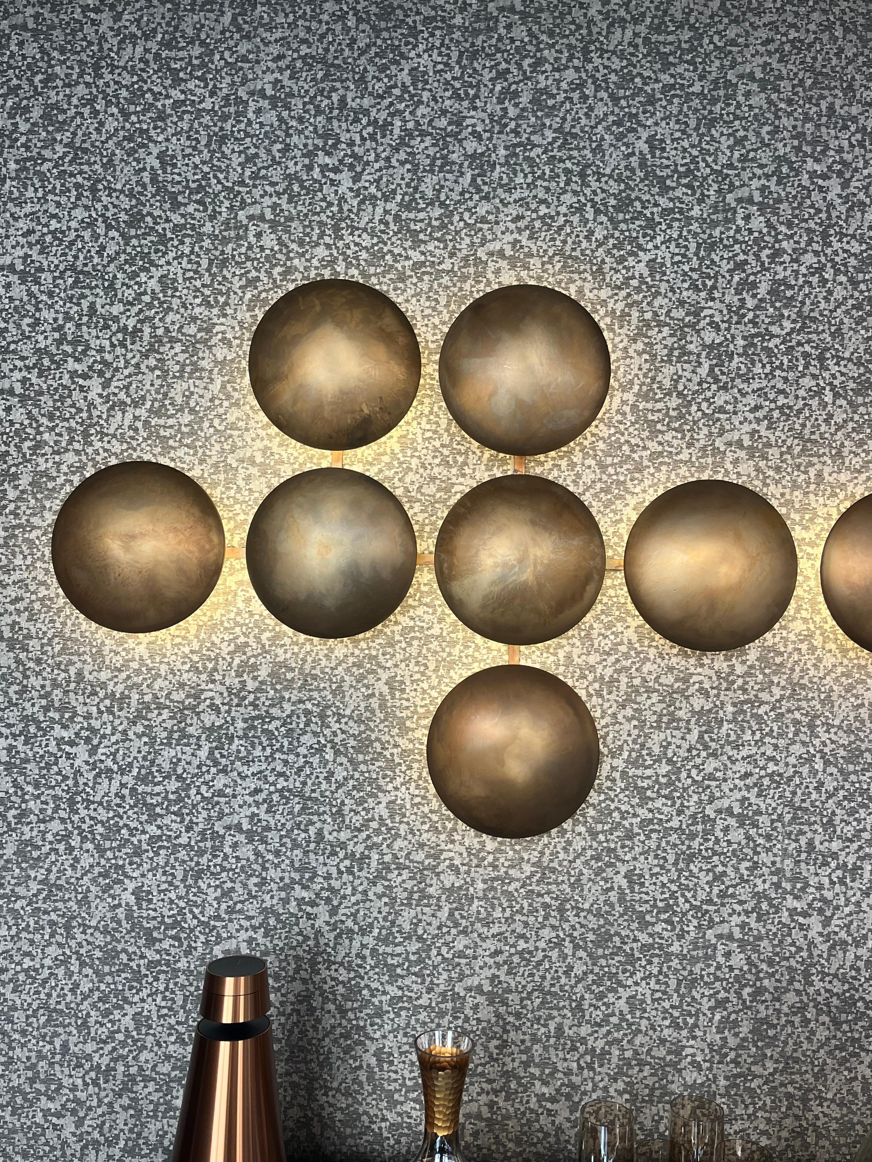 More an art installation than a light fixture, LED power-saving Light Clips are artistic and chic, emitting soft light while brightening up any bland wall.