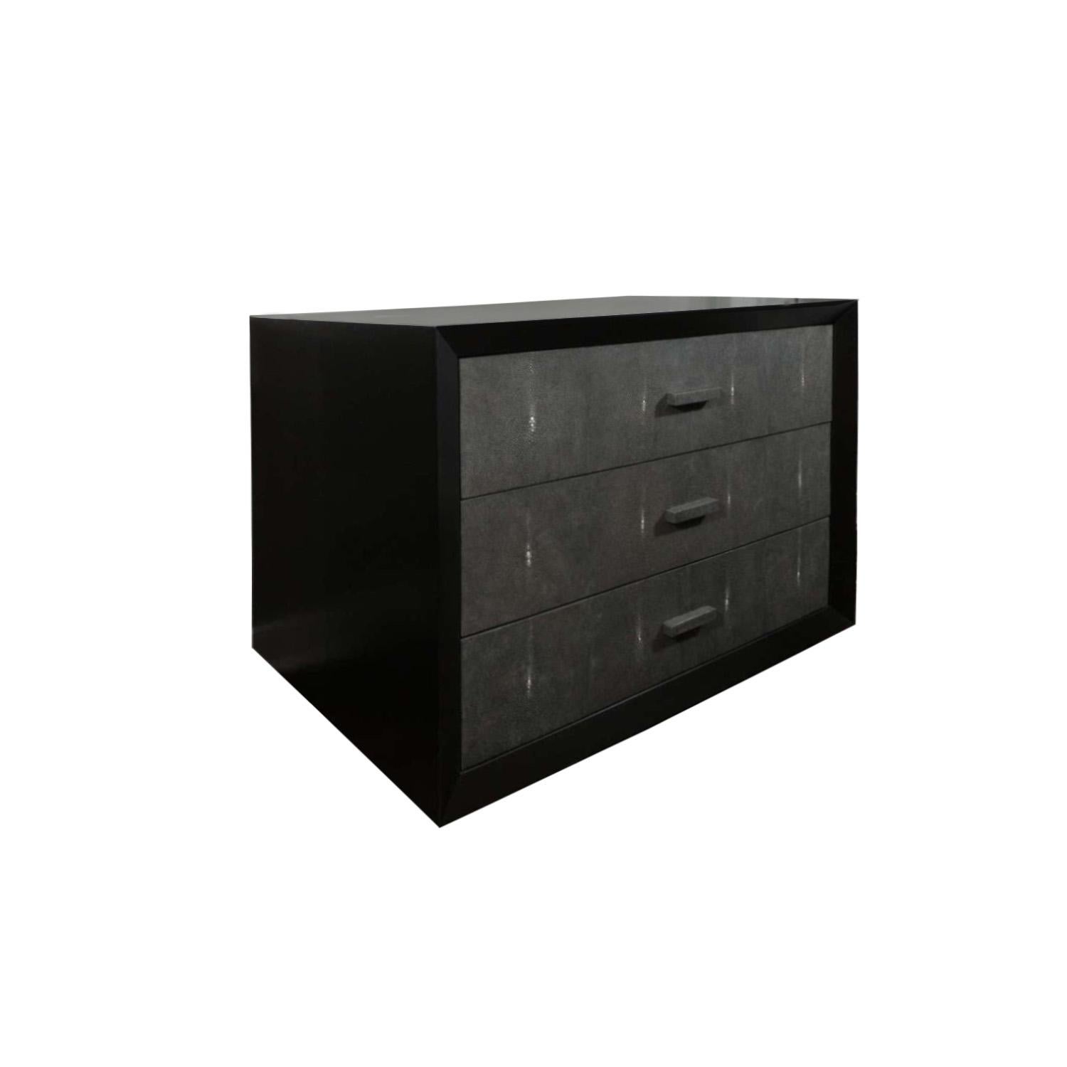 Made to order, custom lacquer and shagreen 3- drawer dresser. Elegant black lacquered three drawer dresser with genuine gray shagreen drawer fronts.

The floor model for this piece is available for sale. 