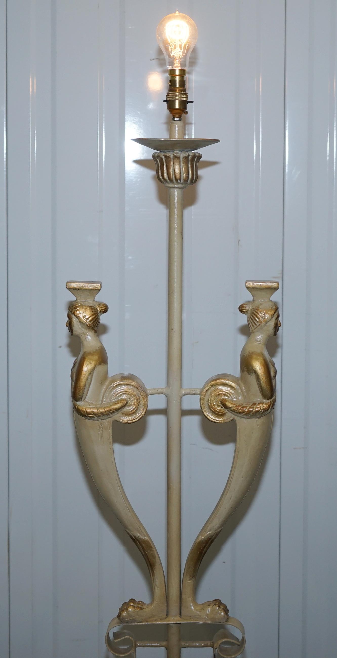 We are delighted to offer for sale this lovely floor standing hand painted metal lamp depicting a ships bust or figurehead and finished with a lion's hairy paw foot

A very good looking and nicely observed piece, its all metal, hand painted, it