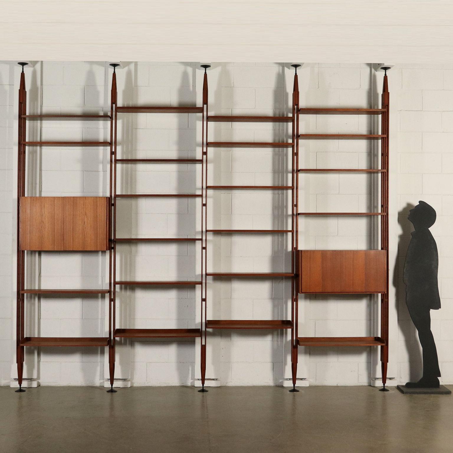 Modular floor-to-ceiling bookcase designed by Franco Albini (1905-1977) for Poggi. Adjustable shelves and containers, solid teak uprights, teak veneered shelves and containers. Model: LB7. Manufactured in Italy, 1960s.