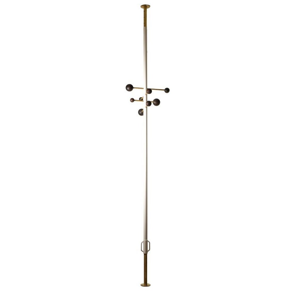 Floor-to-ceiling coat rack made of lacquered metal and brass. Contemporary. For Sale