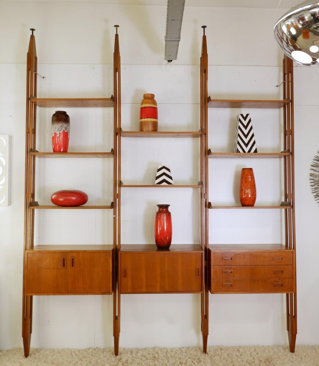 Floor-to-ceiling wall Unit in the style of Franco Albini, 1960s
Product details
Dimensions   D:  40,5 cm    H:  320 cm (125.98