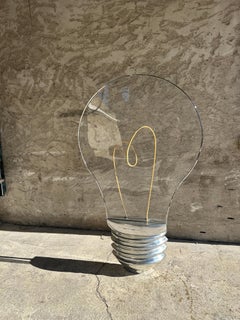 Floorlamp in the shape of a giant bulb