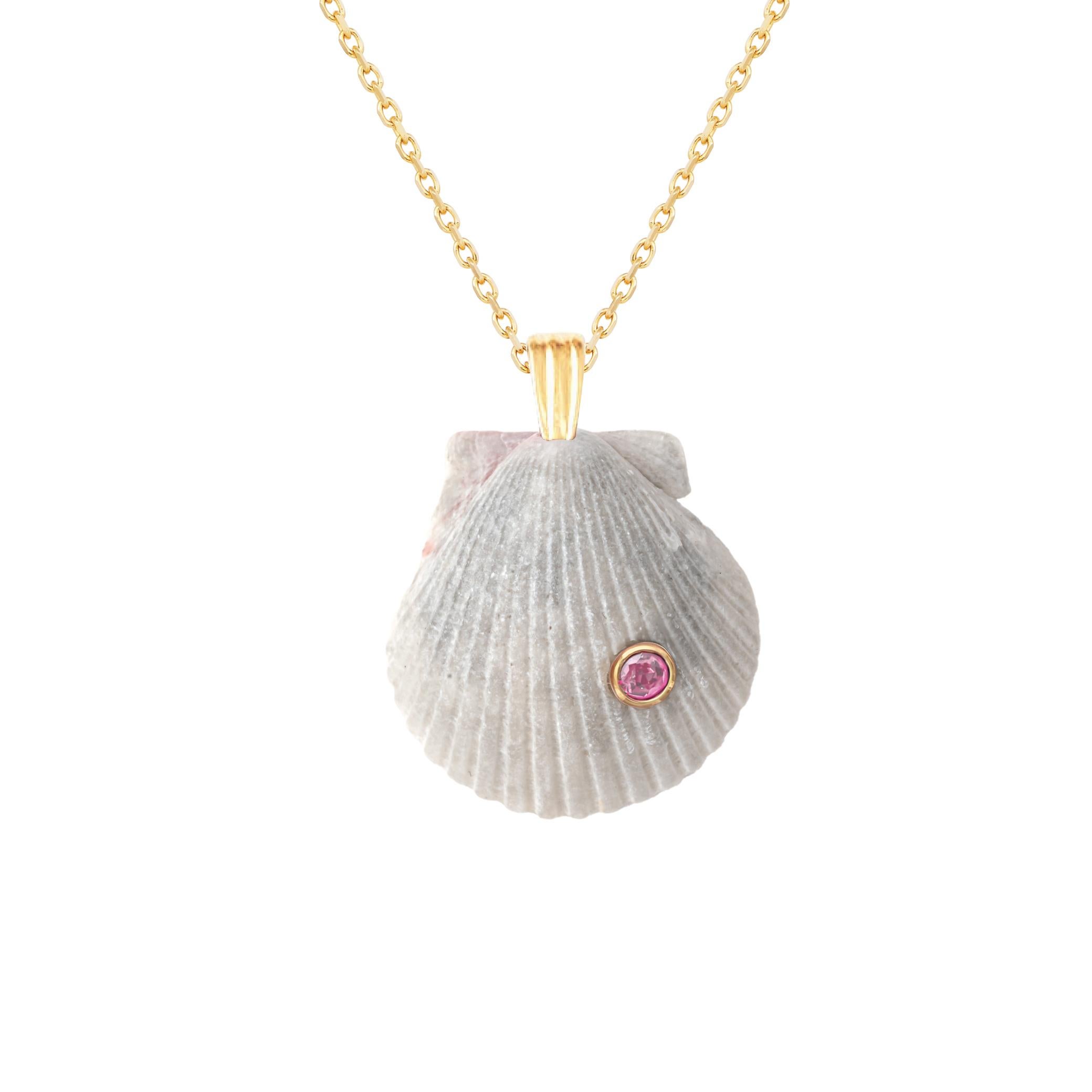 Natural shell pendant with solid 14k gold findings and natural pink tourmaline gemstone. Wear this pendant alone or layer it with other gold chains for a beautiful layered effect.  

Order includes one shell pendant, exactly as depicted in primary