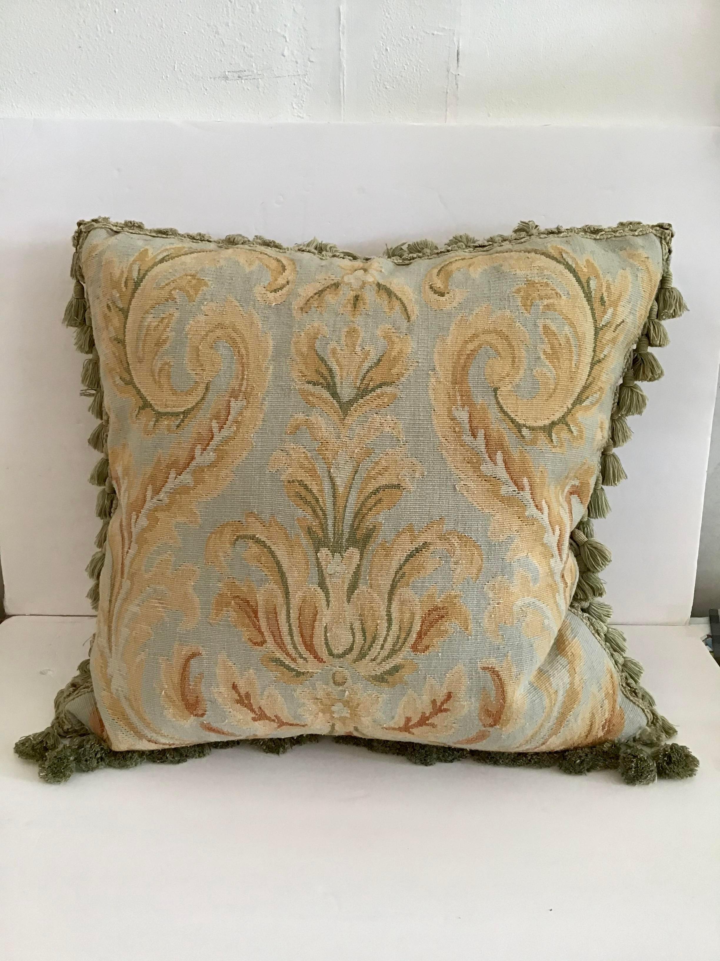 Gorgeous handwork on this Aubusson down pillow with decorative fringe. Add some chic style to your decor. Includes the down insert.