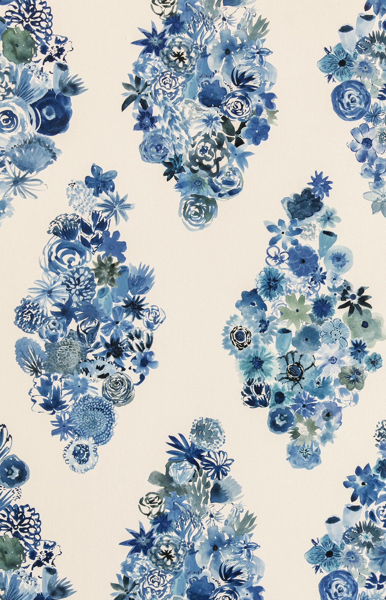 “Flora” in ‘Casbah Blue’ is a floral wallpaper designed by Flat Vernacular. Featuring shades of ultramarine, navy, manganese blue, and pool blue, this painterly pattern is comprised of many kinds of real (and imaginary) flowers arranged in diamond