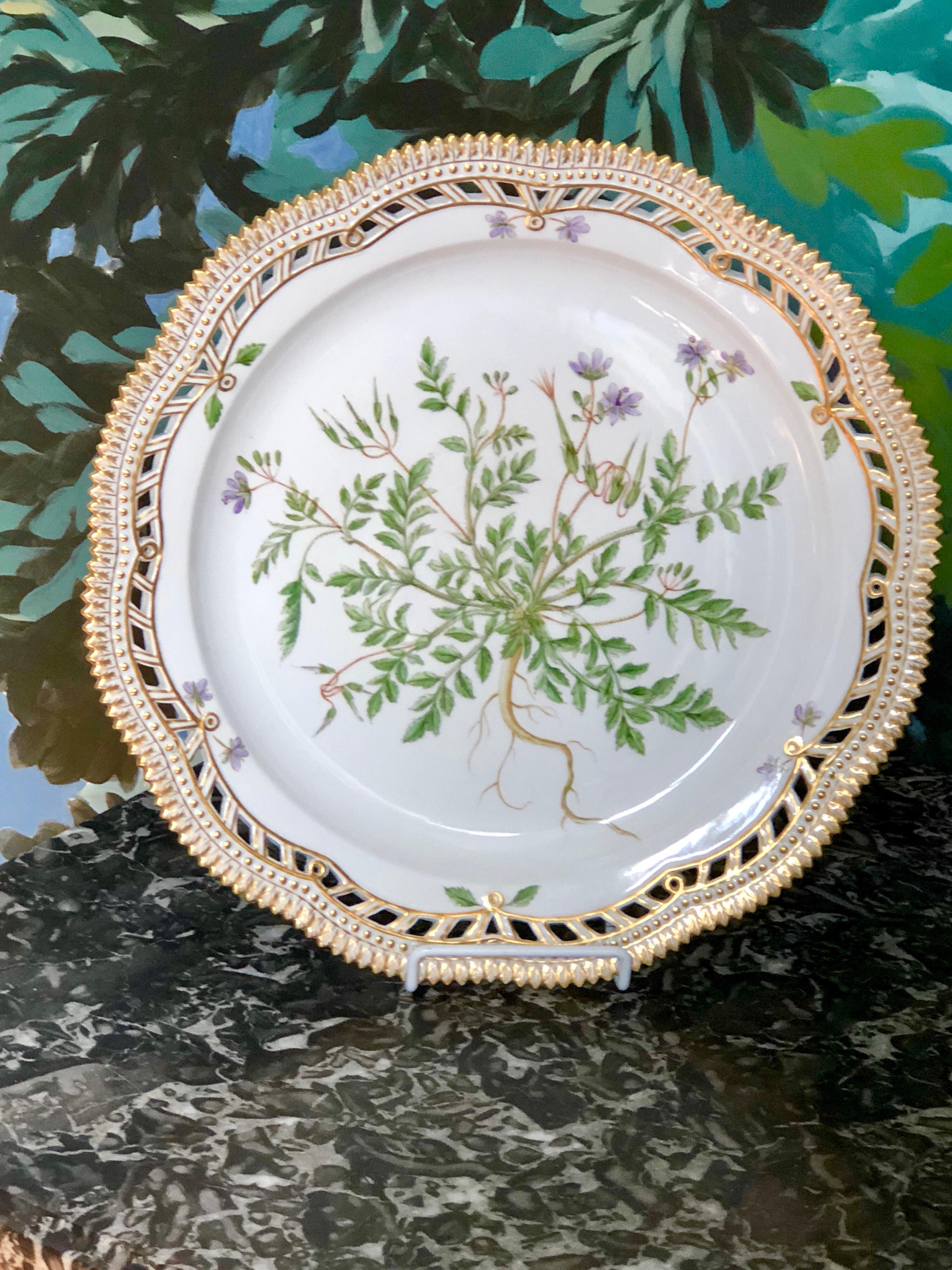 A beautiful 13” diameter Flora Danica platter with reticulated border and jagged edge. The underside displays the Latin name of the flower:”Erodium Cicutarium”.
Also the maker’s mark in green Royal Copenhagen Denmark and the hand-painted underglaze