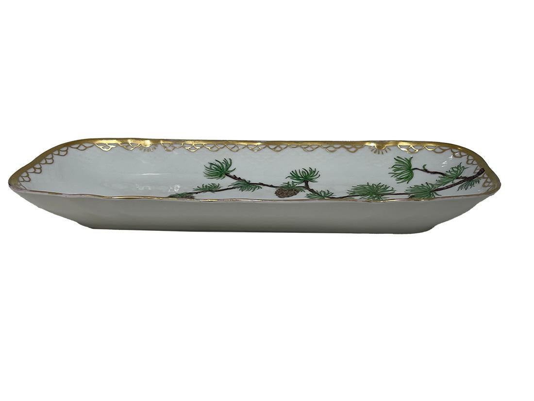 Flora Danica porcelain rectangular plate by Bing & Grøndahl, Denmark 1929

Porcelain rectangular plate by Bing & Grøndahl hand-painted by Frida Meyer (Gluud) 
A porcelain rectangular plate, made in 1929 with the hand-painted Flora Danica pattern and